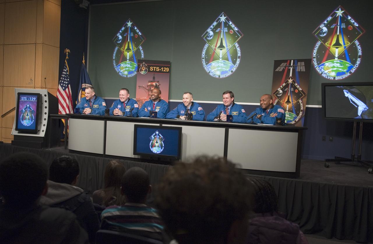 Crew members from STS-129 from left; Charles Hobaugh, Commander, Barry Wilmore, Pilot, Mission Specialists, Leland Melvin, Randy Bresnick, Mike Foreman and Robert Satcher, are seen, Monday, Jan. 11, 2010, during a presentation to staff and middle school students from the Congressional Schools of Virginia at NASA Headquarters in Washington. Photo Credit: (NASA/Paul E. Alers)