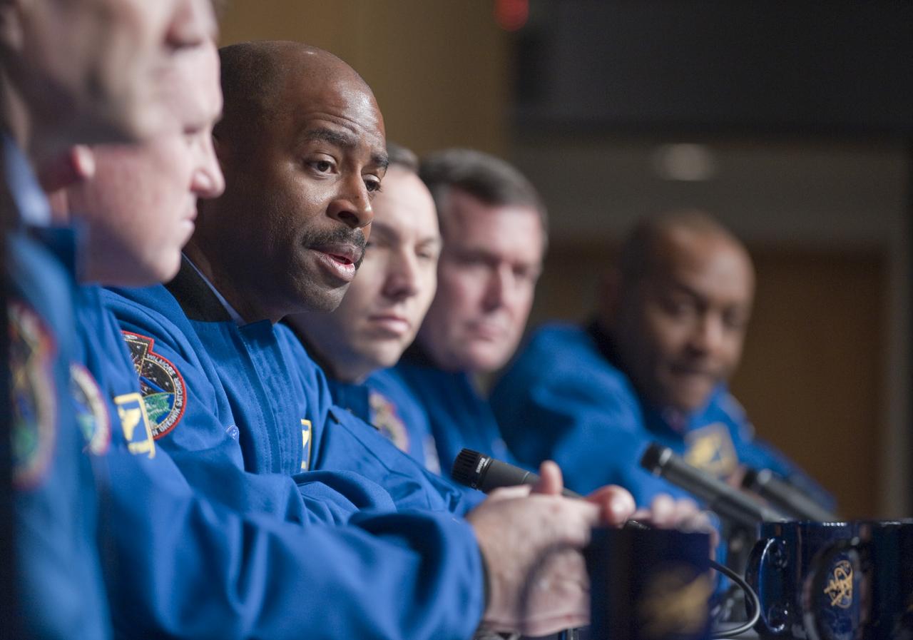 STS-129 Mission Specialist Leland Melvin,  answers a question as fellow crew members look on, Monday, Jan. 11, 2010, during a presentation to staff and middle school students from the Congressional Schools of Virginia at NASA Headquarters in Washington. Photo Credit: (NASA/Paul E. Alers)
