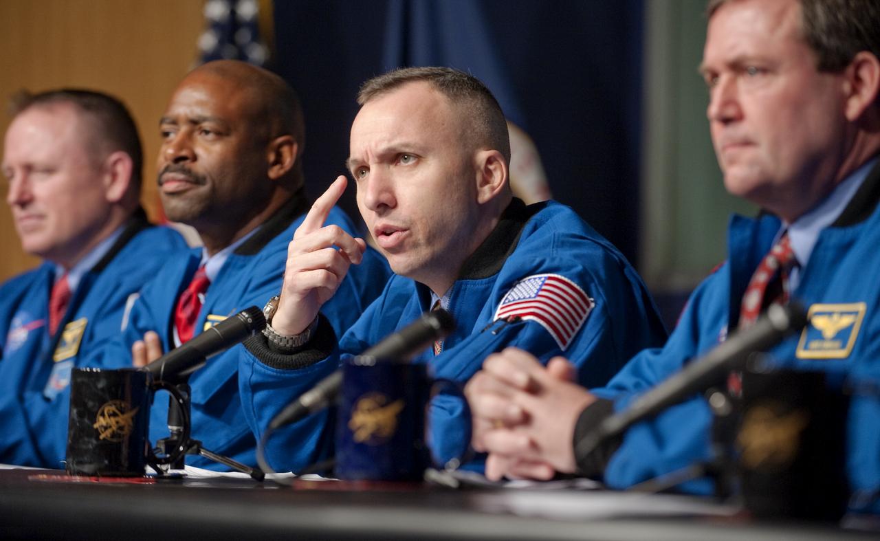 STS-129 Mission Specialist Randy Bresnick, second from right, answers a question from the audience as fellow crew members look on, Monday, Jan. 11, 2010, during a presentation to staff and middle school students from the Congressional Schools of Virginia at NASA Headquarters in Washington. Photo Credit: (NASA/Paul E. Alers)