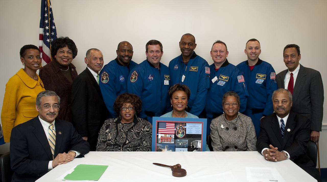 NASA Administrator Charles Bolden, space shuttle crew STS-129 and members of the Congressional Black Caucus pose for a group photo at the Capitol Building, Wednesday, Jan. 13, 2010, in Washington.  Back row from left to right: U.S. Rep Donna Edwards (D-MD), U.S. Rep Diane Watson (D-CA), NASA Administrator Charles Bolden, astronauts Leland Melvin, Mike Foreman, Robert Satcher, Barry Wilmore, Randy Breznik, and U.S. Rep Mel Watt (D-NC).  Front row from left to right: U.S. Rep Robert Scott (D-VA), U.S. Rep. Corrine Brown (D-Fla), U.S. Rep. Barbara Lee (D-CA), U.S. Rep. Donna Christensen (D-VI) and U.S. Rep. Donald Payne (D-NJ).  The crew of STS-129 presented the CBC with a montage commemorating their mission.  Photo Credit:  (NASA/Paul E. Alers)