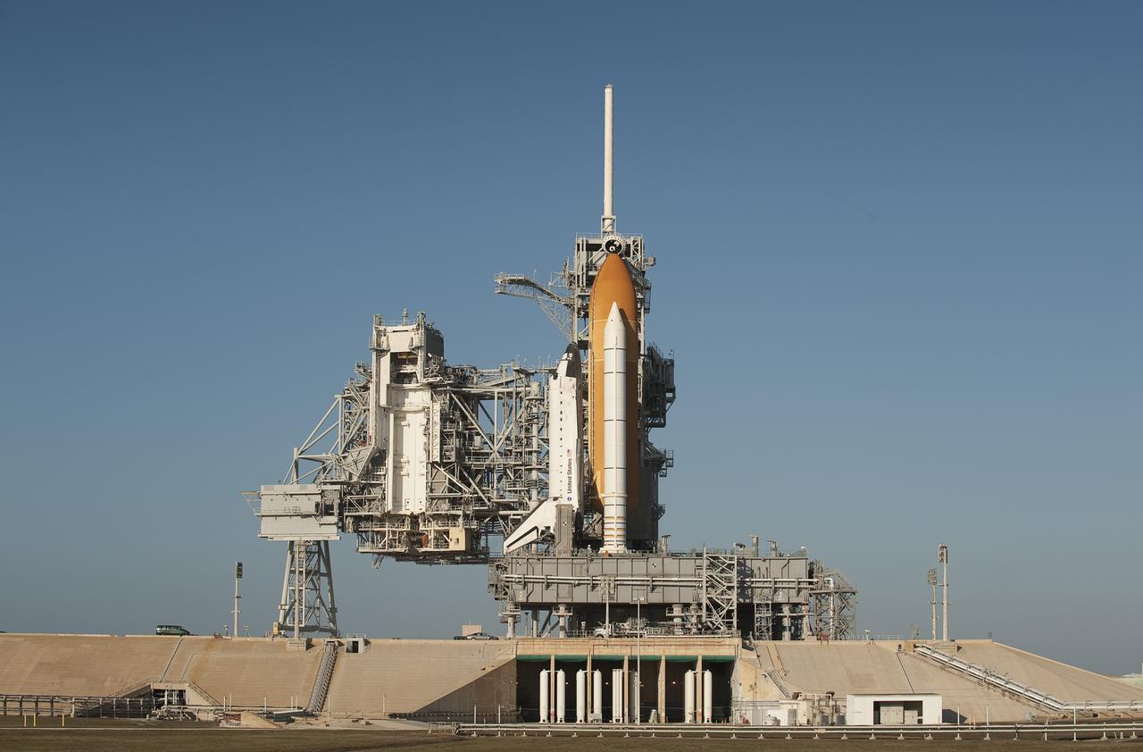 The space shuttle Endeavour is seen shortly after the rotating service structure is rolled back on Saturday Feb. 6, 2010 at pad 39a of the NASA Kennedy Space Center in Cape Canaveral, Florida.  Endeavour and the crew members of the STS-130 mission are set to launch on Sunday at 4:39 a.m. EST.  Photo Credit: (NASA/Bill Ingalls)