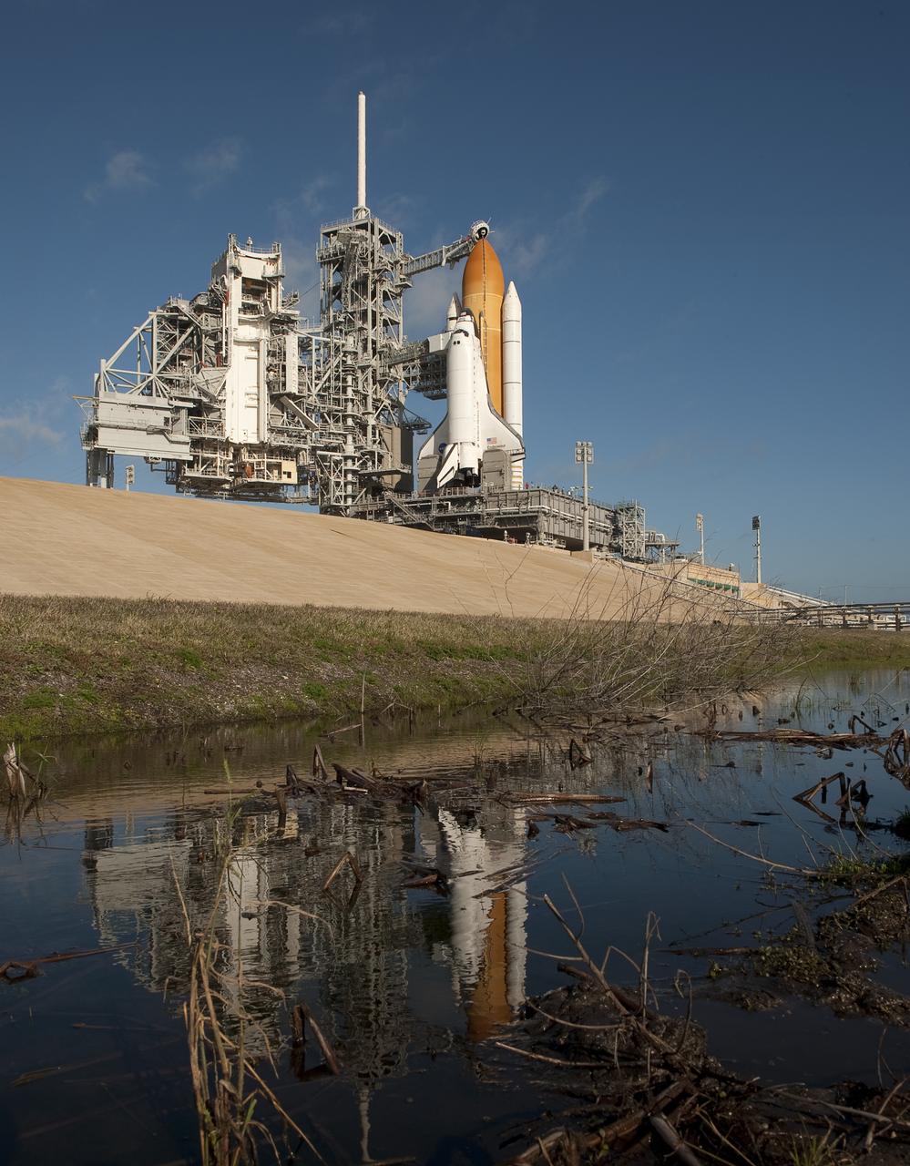 The space shuttle Endeavour is seen after the rotating service structure is rolled back on Saturday Feb. 6, 2010 at pad 39a of the NASA Kennedy Space Center in Cape Canaveral, Florida.  Endeavour and the crew members of the STS-130 mission are set to launch on Sunday at 4:39 a.m. EST.  Photo Credit: (NASA/Bill Ingalls)