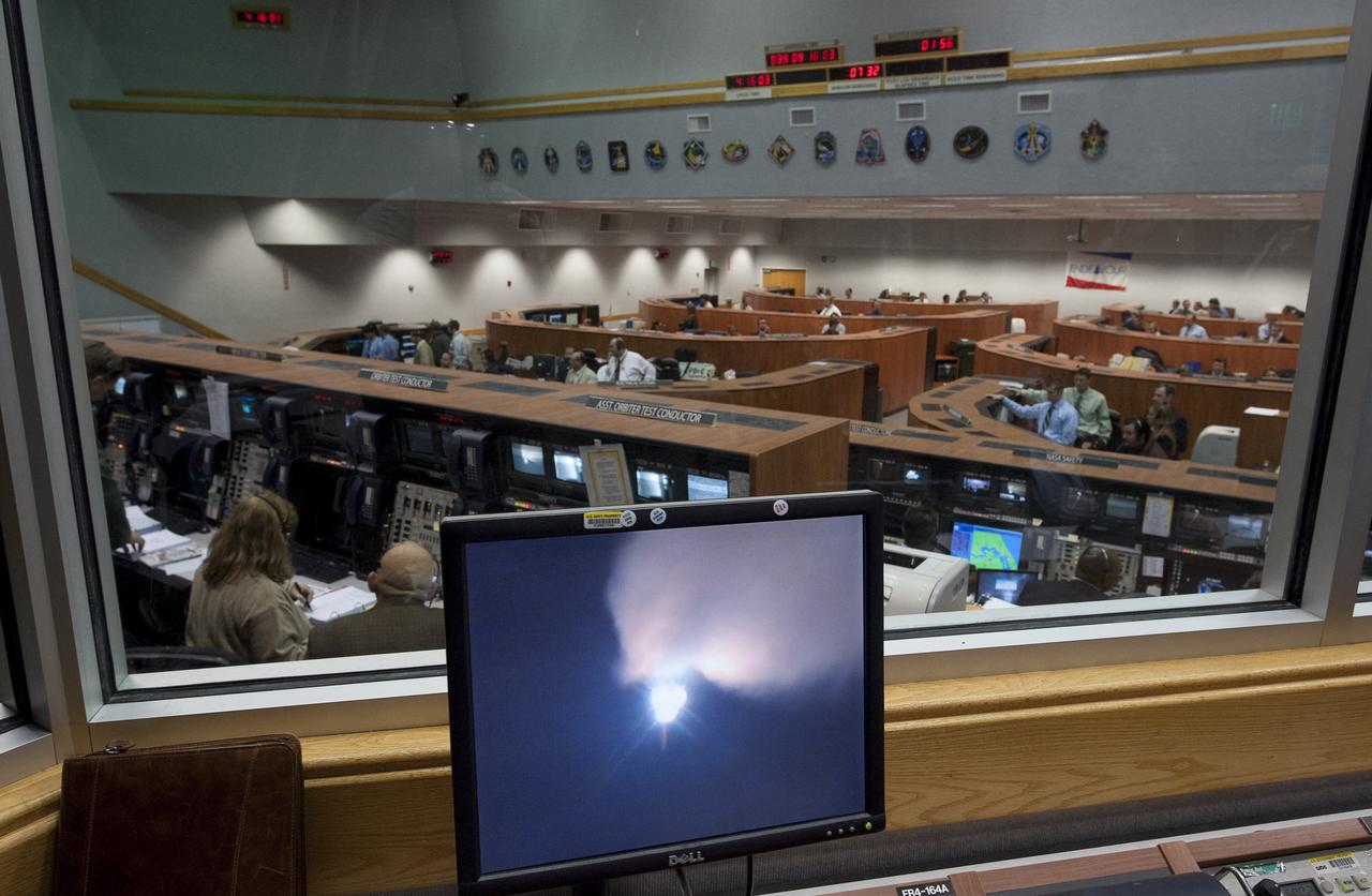 The space shuttle Endeavour is seen on a monitor in Firing Room Four of the Launch Control Center as it launches from pad 39a at NASA Kennedy Space Center in Cape Canaveral, Fla. on Monday Feb. 8, 2010. Endeavour and it the STS-130 mission crew will deliver to the International Space Station a third connecting module, the Italian-built Tranquility node and the seven-windowed cupola, which will be used as a control room for robotics. The mission will feature three spacewalks. Photo Credit: (NASA/Bill Ingalls)