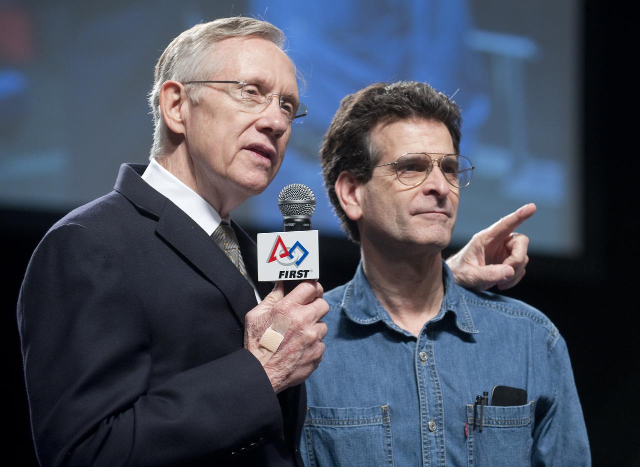 U.S. Senate Majority Leader Harry Reid, D-Nev., left, stands with Dean Kamen, the founder of First Robotics, as he talks about the importance of Science and Technology education during the First Robotics Competition, Friday March 5, 2010, in Washington. The student competition is called "For Inspiration and Recognition ofScience and Technology," or FIRST. The program was founded in 1989 by Kamen to inspire an appreciation of science and technology in young people, their schools and communities.   Photo Credit: (NASA/Paul E. Alers)