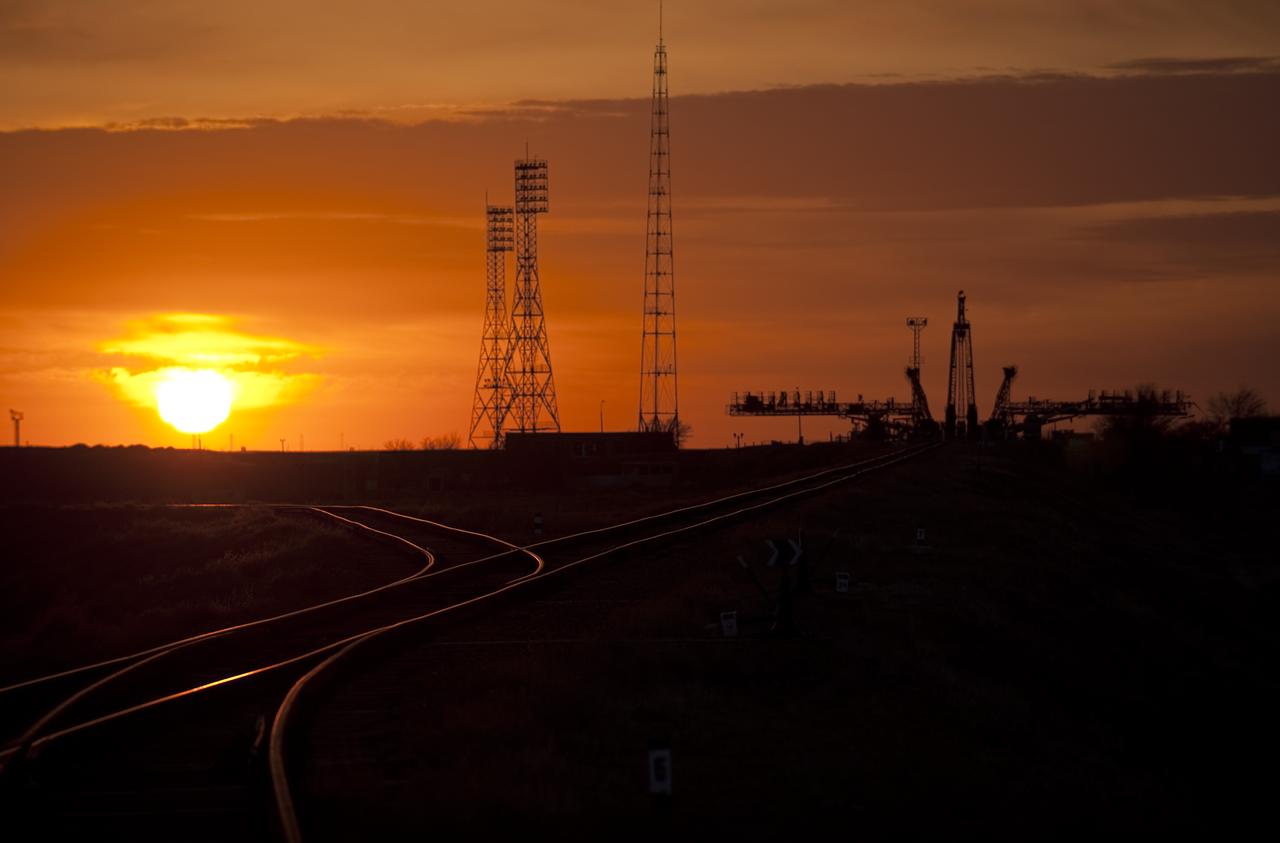 The sun rises behind the Soyuz launch pad shortly before the Soyuz TMA-18 spacecraft is rolled out by train to the launch pad at the Baikonur Cosmodrome, Kazakhstan, Wednesday, March, 31, 2010. The launch of the Soyuz spacecraft with Expedition 23 Soyuz Commander Alexander Skvortsov of Russia, Flight Engineer Mikhail Kornienko of Russia, and NASA Flight Engineer Tracy Caldwell Dyson is scheduled for Friday, April 2, 2010 at 10:04 a.m. Kazakhstan time. Photo Credit (NASA/Bill Ingalls)