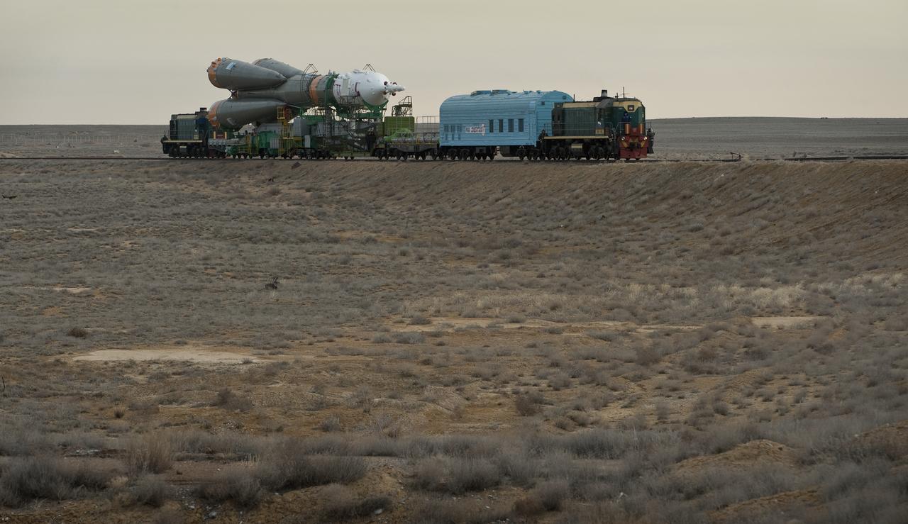 The Soyuz TMA-18 spacecraft is rolled out by train to the launch pad at the Baikonur Cosmodrome, Kazakhstan, Wednesday, March, 31, 2010.  The launch of the Soyuz spacecraft with Expedition 23 Soyuz Commander Alexander Skvortsov of Russia, Flight Engineer Mikhail Kornienko of Russia and NASA Flight Engineer Tracy Caldwell Dyson is scheduled for Friday, April 2, 2010 at 10:04 a.m. Kazakhstan time.  Photo Credit: (NASA/Carla Cioffi) 