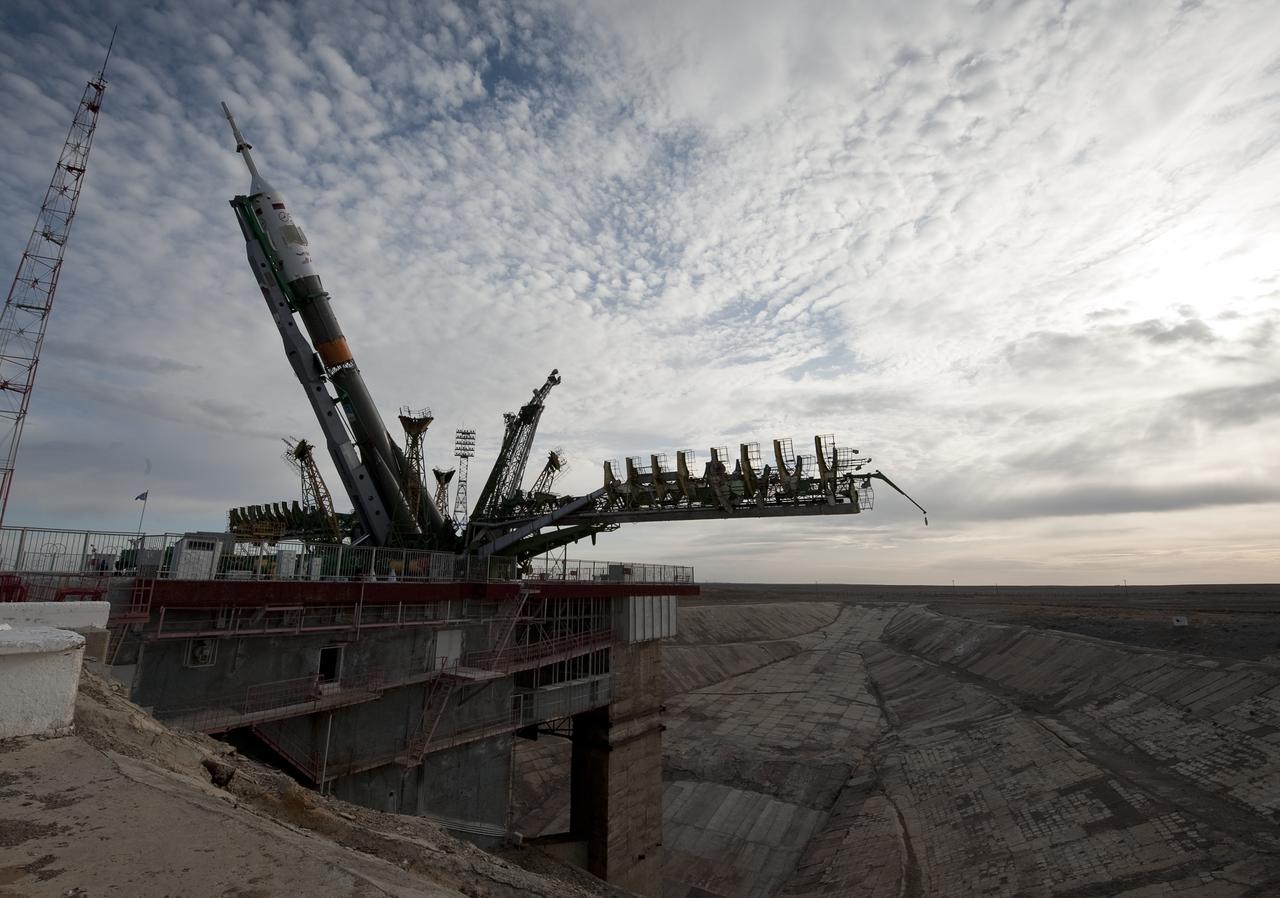 The Soyuz TMA-18 spacecraft is raised into position shortly after it was rolled out by train to the launch pad at the Baikonur Cosmodrome, Kazakhstan, Wednesday, March, 31, 2010. The launch of the Soyuz spacecraft with Expedition 23 Soyuz Commander Alexander Skvortsov of Russia, Flight Engineer Mikhail Kornienko of Russia, and NASA Flight Engineer Tracy Caldwell Dyson is scheduled for Friday, April 2, 2010 at 10:04 a.m. Kazakhstan time. Photo Credit (NASA/Bill Ingalls)