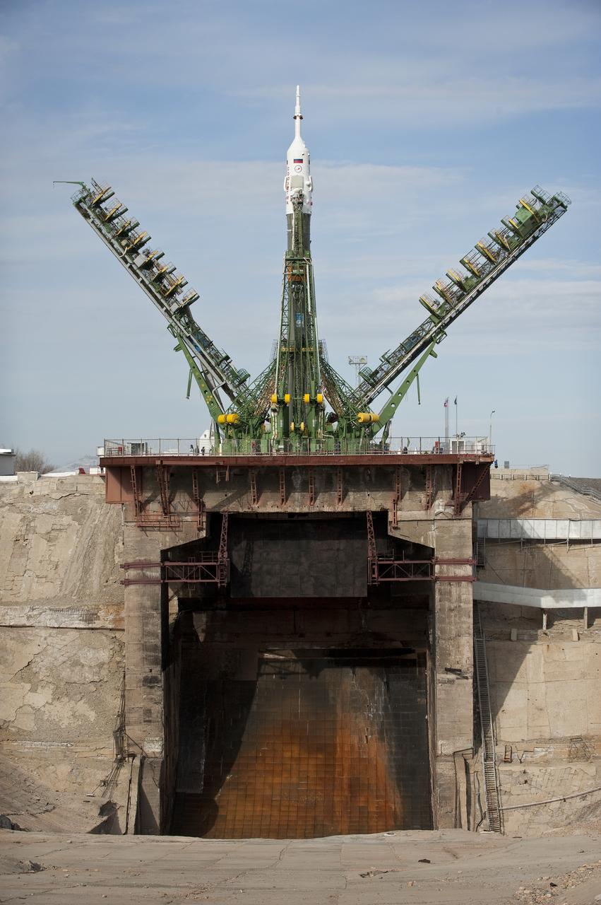 The Soyuz TMA-18 spacecraft is raised into position shortly after it was rolled out by train to the launch pad at the Baikonur Cosmodrome, Kazakhstan, Wednesday, March, 31, 2010. The launch of the Soyuz spacecraft with Expedition 23 Soyuz Commander Alexander Skvortsov of Russia, Flight Engineer Mikhail Kornienko of Russia, and NASA Flight Engineer Tracy Caldwell Dyson is scheduled for Friday, April 2, 2010 at 10:04 a.m. Kazakhstan time. Photo Credit (NASA/Carla Cioffi)