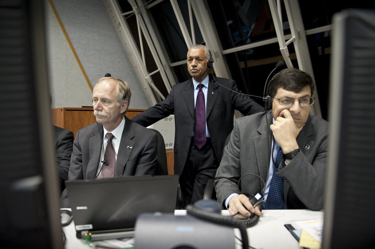 NASA Associate Administrator for Space Operations Bill Gerstenmaier, left, NASA Administrator Charles Bolden, center, and NASA Associate Administrator Chris Scolese monitor the launch countdown of the space shuttle Discovery and the start of the STS-131 mission from the Launch Control Center at NASA Kennedy Space Center in Cape Canaveral, Fla. on Monday April 5, 2010. Discovery is carrying a multi-purpose logistics module filled with science racks for the laboratories aboard the station. The mission has three planned spacewalks, with work to include replacing an ammonia tank assembly, retrieving a Japanese experiment from the station’s exterior, and switching out a rate gyro assembly on the S0 segment of the station’s truss structure. Photo Credit: (NASA/Bill Ingalls)