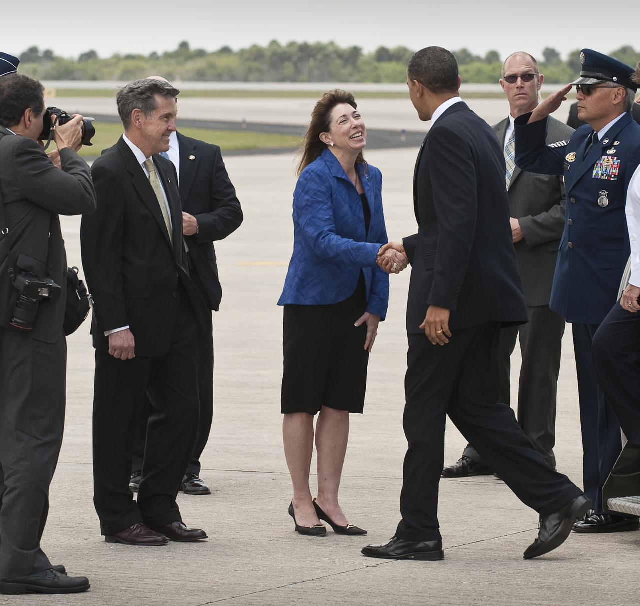 NASA Deputy Administrator Lori Garver shakes hands with President Barack Obama as she and NASA Kennedy Space Center Director Bob Cabana, left, welcome the President to Kennedy in Cape Canaveral, Fla. on Thursday, April 15, 2010. Obama visited Kennedy to deliver remarks on the bold new course the administration is charting to maintain U.S. leadership in human space flight. Photo Credit: (NASA/Bill Ingalls)