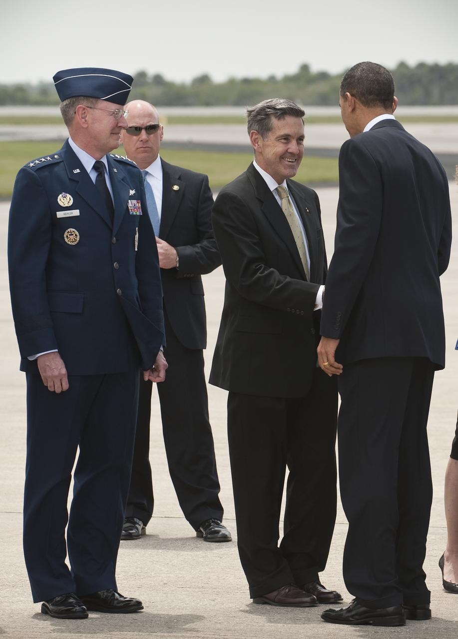 NASA Kennedy Space Center Director bob Cabana shakes hands with President Barack Obama as he and Gen. C. Robert Kehler, Commander, Air Force Space Command, left, welcome the President to Kennedy in Cape Canaveral, Fla. on Thursday, April 15, 2010. Obama visited Kennedy to deliver remarks on the bold new course the administration is charting to maintain U.S. leadership in human space flight. Photo Credit: (NASA/Bill Ingalls)