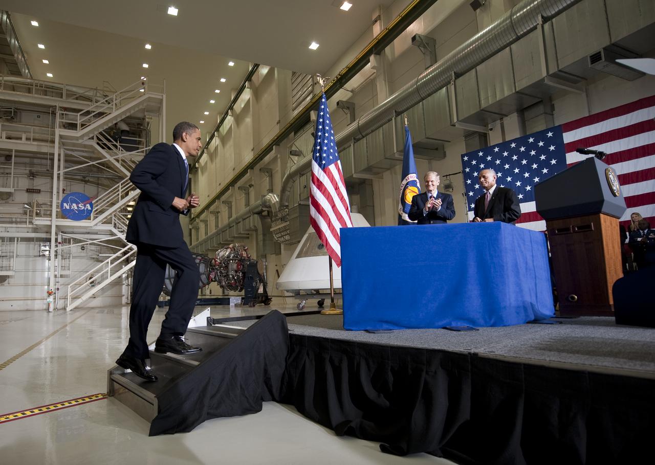 President Barack Obama takes the stage after being introduced by NASA Administrator Charles Bolden, right, and US Senator Bill Nelson (D-FL) during an event where Obama outlined a bold new course the administration is charting to maintain U.S. leadership in human space flight at the NASA Kennedy Space Center in Cape Canaveral, Fla. on Thursday, April 15, 2010. Photo Credit: (NASA/Bill Ingalls)