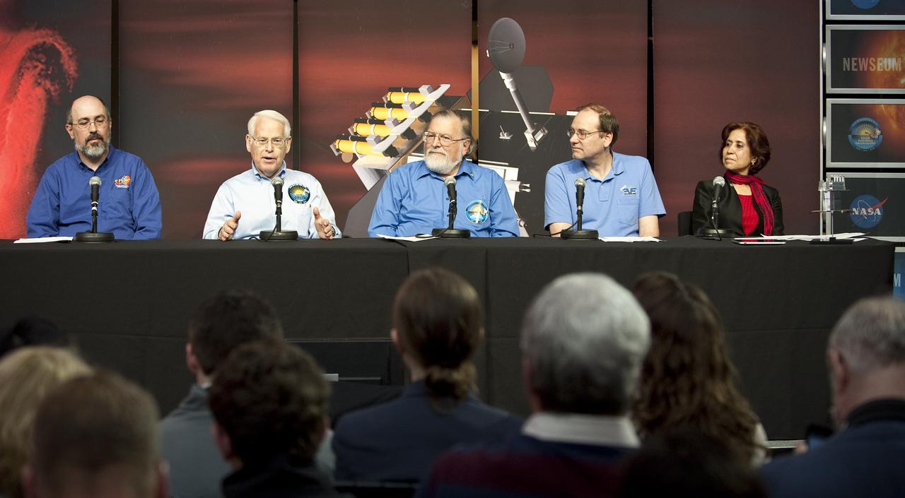 Alan Title, second from left, principal investigator, Atmospheric Imaging Assembly instrument, Lockheed Martin Solar and Astrophysics Laboratory in Palo Alto, speaks during a briefing to discuss recent images from NASA's Solar Dynamics Observatory, or SDO, Wednesday, April 21, 2010, at the Newseum in Washington.  Launched on Feb. 11, 2010, SDO is the most advanced spacecraft ever designed to study the sun. During its five-year mission, it will examine the sun's magnetic field and also provide a better understanding of the role the sun plays in Earth's atmospheric chemistry and climate. Pictured from left to right:  Dean Pesnell, SDO project scientist, Goddard Space Flight Center in Greenbelt, Md., Alan Title, Philip H. Scherrer, principal investigator, Helioseismic and Magnetic Imager instrument, Stanford University in Palo Alto, Tom Woods, principal investigator, Extreme Ultraviolet Variability Experiment instrument, Laboratory for Atmospheric and Space Physics, University of Colorado in Boulder and Madhulika Guhathakurta, SDO program scientist, NASA Headquarters in Washington.  Photo Credit: (NASA/Carla Cioffi)