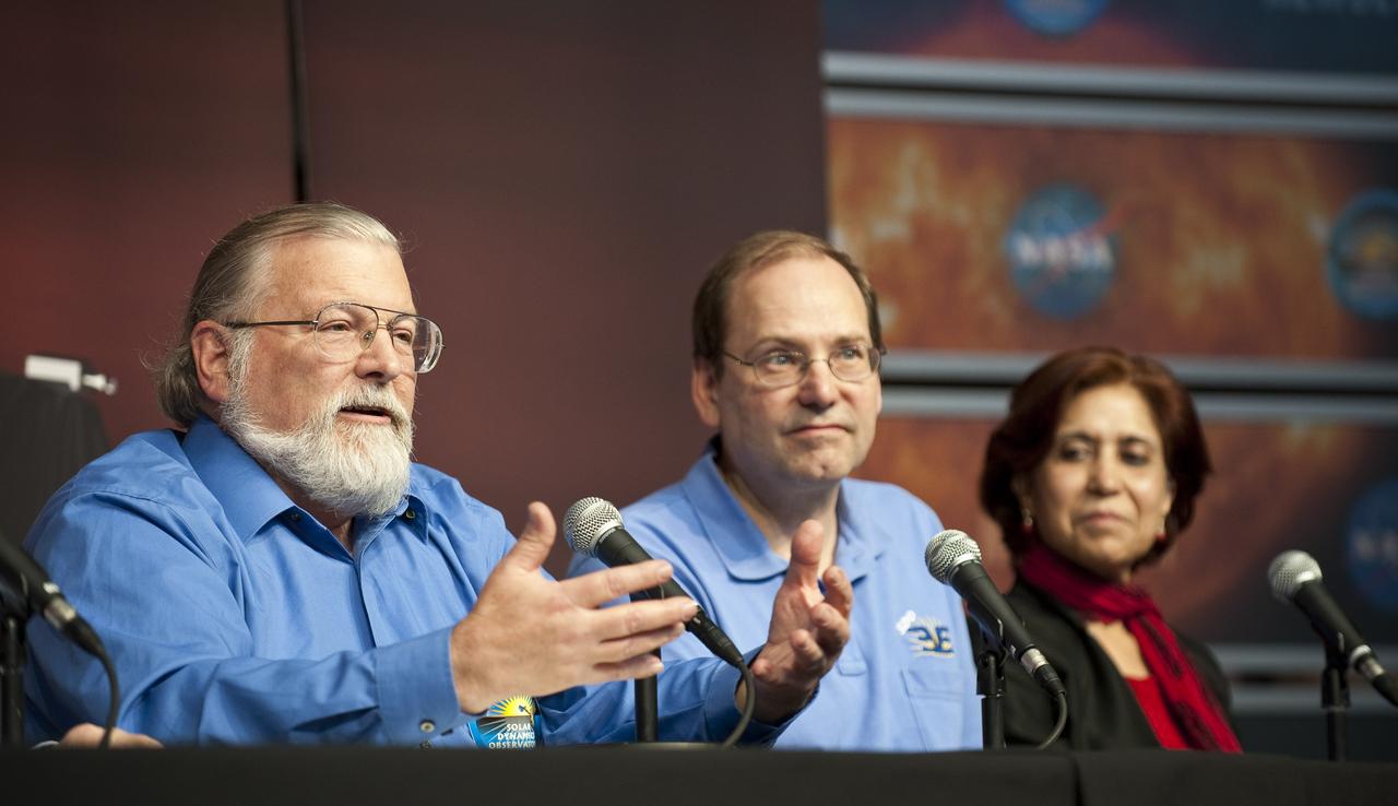 Philip H. Scherrer (left) principal investigator, Helioseismic and Magnetic Imager instrument, Stanford University in Palo Alto, speaks during a briefing to discuss recent images from NASA's Solar Dynamics Observatory, or SDO, while colleagues Tom Woods, principal investigator, Extreme Ultraviolet Variability Experiment instrument, Laboratory for Atmospheric and Space Physics, University of Colorado in Boulder and Madhulika Guhathakurta, SDO program scientist, NASA Headquarters (right) look on Wednesday, April 21, 2010, at the Newseum in Washington.  Photo Credit:  (NASA/Carla Cioffi)