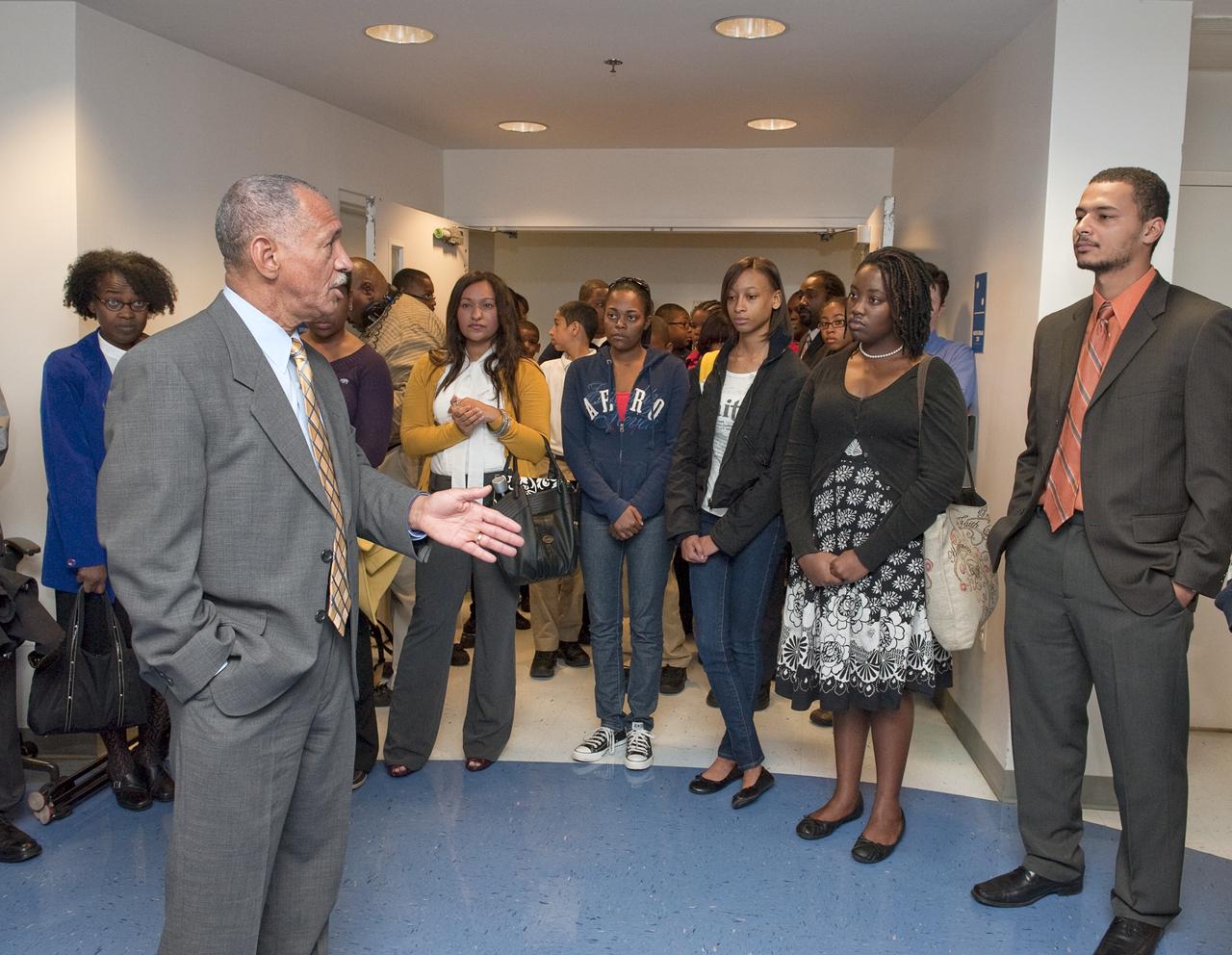 NASA Administrator Charles Bolden, foreground, speaks with Howard University students after he and and U.S. Environmental Protection Agency (EPA) Administrator Lisa P.  Jackson, right, signed a Memorandum of Agreement (MOA) to promote collaboration between the two agencies for cooperation in environmental and Earth sciences and environmental management applications at the Howard University Middle School of Mathematics and Science, Monday, April 26, 2010, in Washington. Photo Credit: (NASA/Paul E. Alers)
