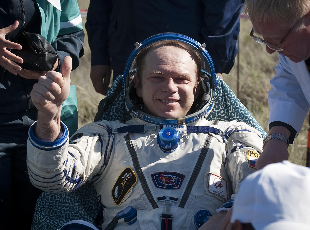 Expedition 23 Commander Oleg Kotov is seen sitting in a chair outside the Soyuz Capsule just minutes after he and fellow crew members T.J. Creamer and Soichi Noguchi landed in their Soyuz TMA-17 capsule near the town of Zhezkazgan, Kazakhstan on Wednesday, June 2, 2010. NASA Astronaut Creamer, Russian Cosmonaut Kotov and Japanese Astronaut Noguchi are returning from six months onboard the International Space Station where they served as members of the Expedition 22 and 23 crews. Photo Credit: (NASA/Bill Ingalls)