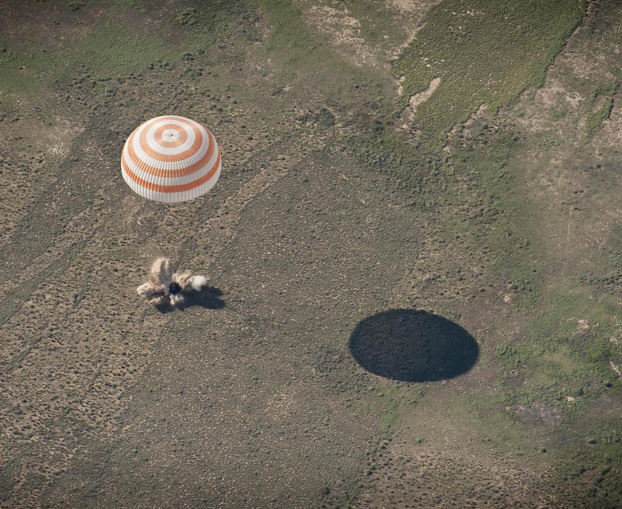 The Soyuz TMA-17 spacecraft is seen as it lands with Expedition 23 Commander Oleg Kotov and Flight Engineers T.J. Creamer and Soichi Noguchi near the town of Zhezkazgan, Kazakhstan on Wednesday, June 2, 2010. NASA Astronaut Creamer, Russian Cosmonaut Kotov and Japanese Astronaut Noguchi are returning from six months onboard the International Space Station where they served as members of the Expedition 22 and 23 crews. Photo Credit: (NASA/Bill Ingalls)