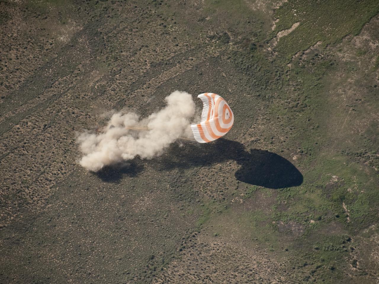 The Soyuz TMA-17 spacecraft is seen as it lands with Expedition 23 Commander Oleg Kotov and Flight Engineers T.J. Creamer and Soichi Noguchi near the town of Zhezkazgan, Kazakhstan on Wednesday, June 2, 2010. NASA Astronaut Creamer, Russian Cosmonaut Kotov and Japanese Astronaut Noguchi are returning from six months onboard the International Space Station where they served as members of the Expedition 22 and 23 crews. Photo Credit: (NASA/Bill Ingalls)