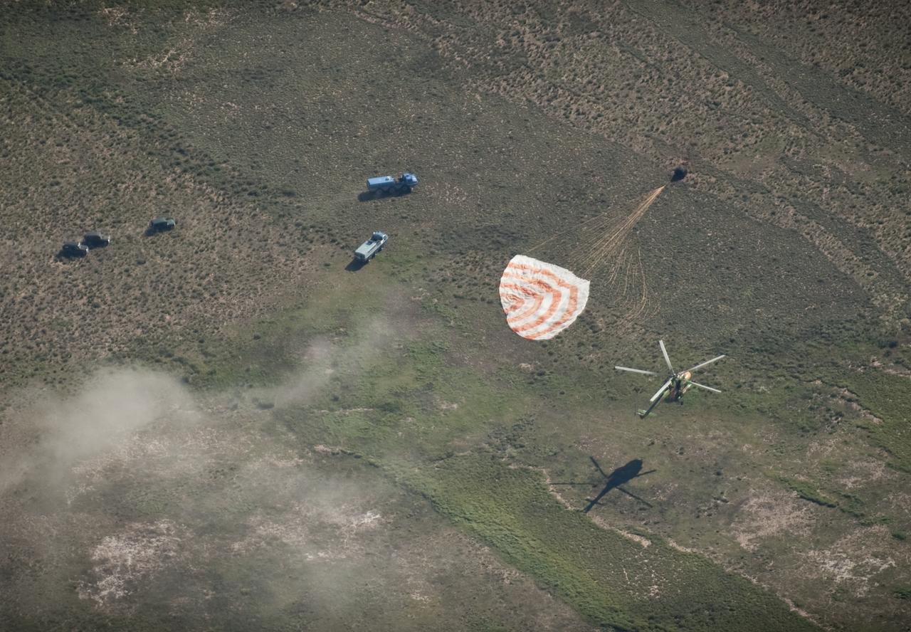 The Soyuz TMA-17 spacecraft is seen as it lands with Expedition 23 Commander Oleg Kotov and Flight Engineers T.J. Creamer and Soichi Noguchi near the town of Zhezkazgan, Kazakhstan on Wednesday, June 2, 2010. NASA Astronaut Creamer, Russian Cosmonaut Kotov and Japanese Astronaut Noguchi are returning from six months onboard the International Space Station where they served as members of the Expedition 22 and 23 crews. Photo Credit: (NASA/Bill Ingalls)
