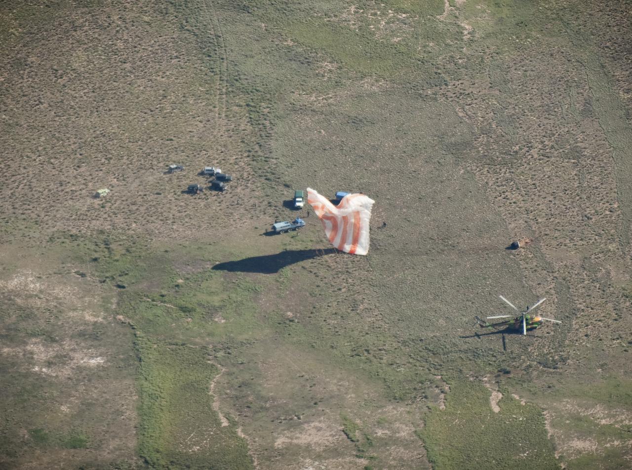 The Soyuz TMA-17 spacecraft is seen as it lands with Expedition 23 Commander Oleg Kotov and Flight Engineers T.J. Creamer and Soichi Noguchi near the town of Zhezkazgan, Kazakhstan on Wednesday, June 2, 2010. NASA Astronaut Creamer, Russian Cosmonaut Kotov and Japanese Astronaut Noguchi are returning from six months onboard the International Space Station where they served as members of the Expedition 22 and 23 crews. Photo Credit: (NASA/Bill Ingalls)