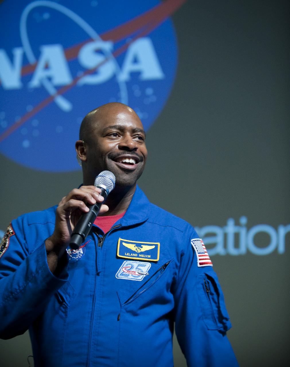 NASA astronaut Leland Melvin welcomes teachers and middle school students to the kick off of NASA's Summer of Innovation program at the Jet Propulsion Laboratory in Pasadena, Calif., Thursday, June 10, 2010. Through the program, NASA will engage thousands of middle school students and teachers in stimulating math and science-based education programs with the goal of increasing the number of future scientists, mathematicians, and engineers.  Photo Credit: (NASA/Bill Ingalls)
