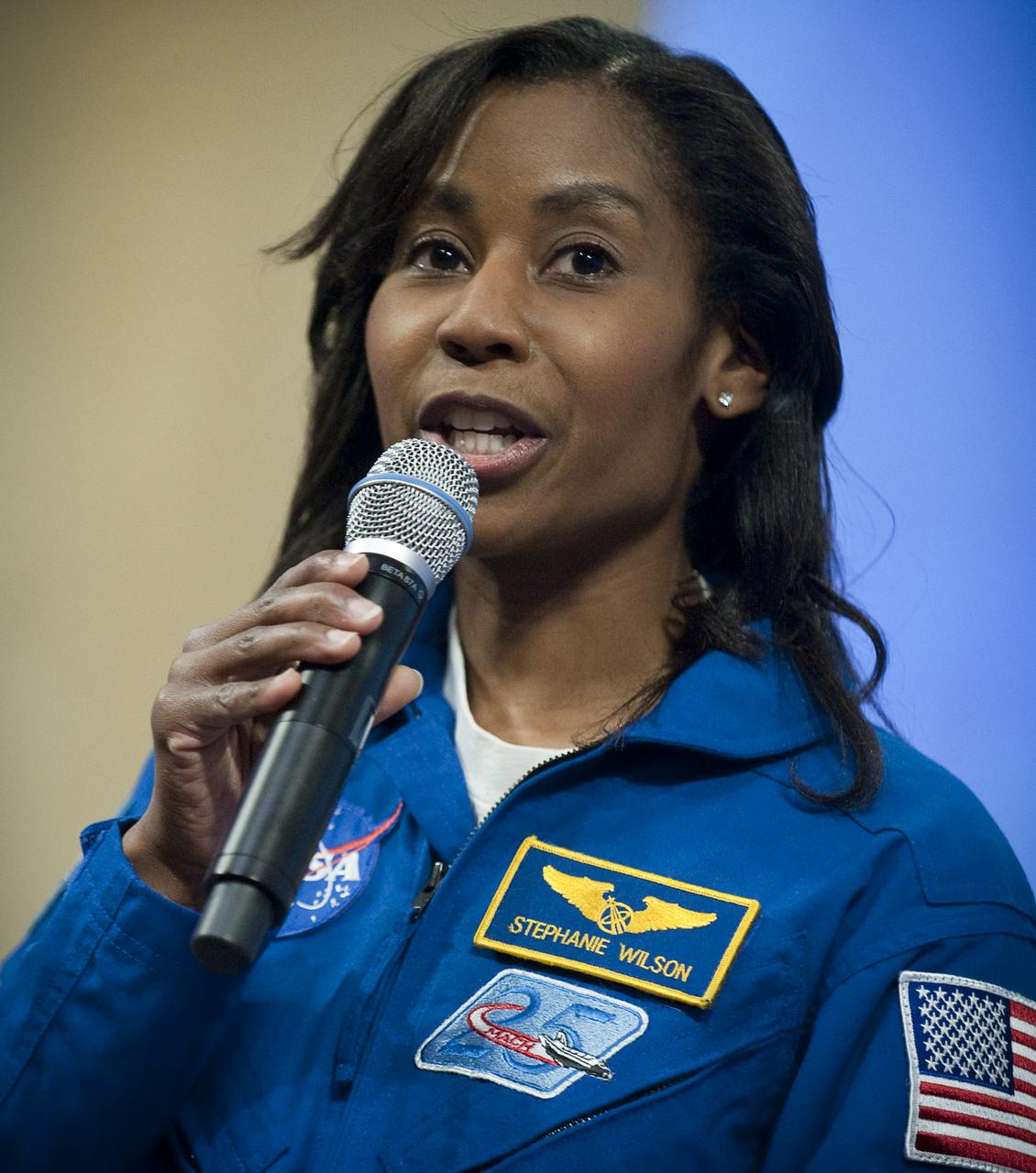 NASA astronaut Stephanie Wilson talks about her experiences to teachers and middle school students during the kick off of NASA's Summer of Innovation program at the Jet Propulsion Laboratory in Pasadena, Calif., Thursday, June 10, 2010. Through the program, NASA will engage thousands of middle school students and teachers in stimulating math and science-based education programs with the goal of increasing the number of future scientists, mathematicians, and engineers.  Photo Credit: (NASA/Bill Ingalls)
