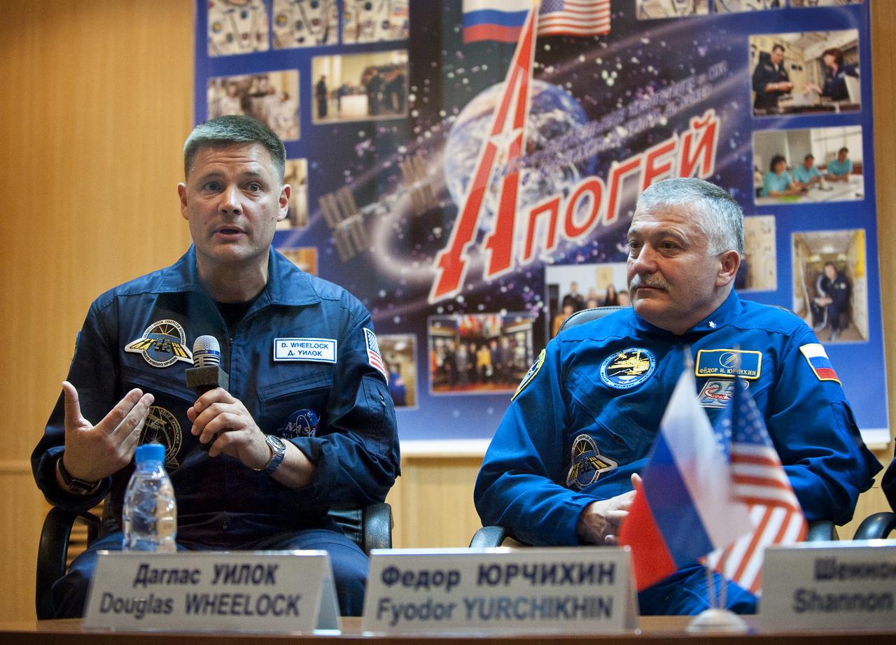 Expedition 24 Flight Engineer Doug Wheelock, left, answers a reporter’s question during a press conference held at the Cosmonaut Hotel in Baikonur, Kazakhstan, while Soyuz Commander Fyodor Yurchikhin looks on, Monday, June 14, 2010.  The launch of the Soyuz spacecraft with Expedition 24 NASA Flight Engineers Shannon Walker and Douglas Wheelock, and Soyuz Commander Fyodor Yurchikhin is scheduled for Wednesday, June 16, 2010 at 3:35 a.m. Kazakhstan time.  Photo Credit: (NASA/Carla Cioffi)