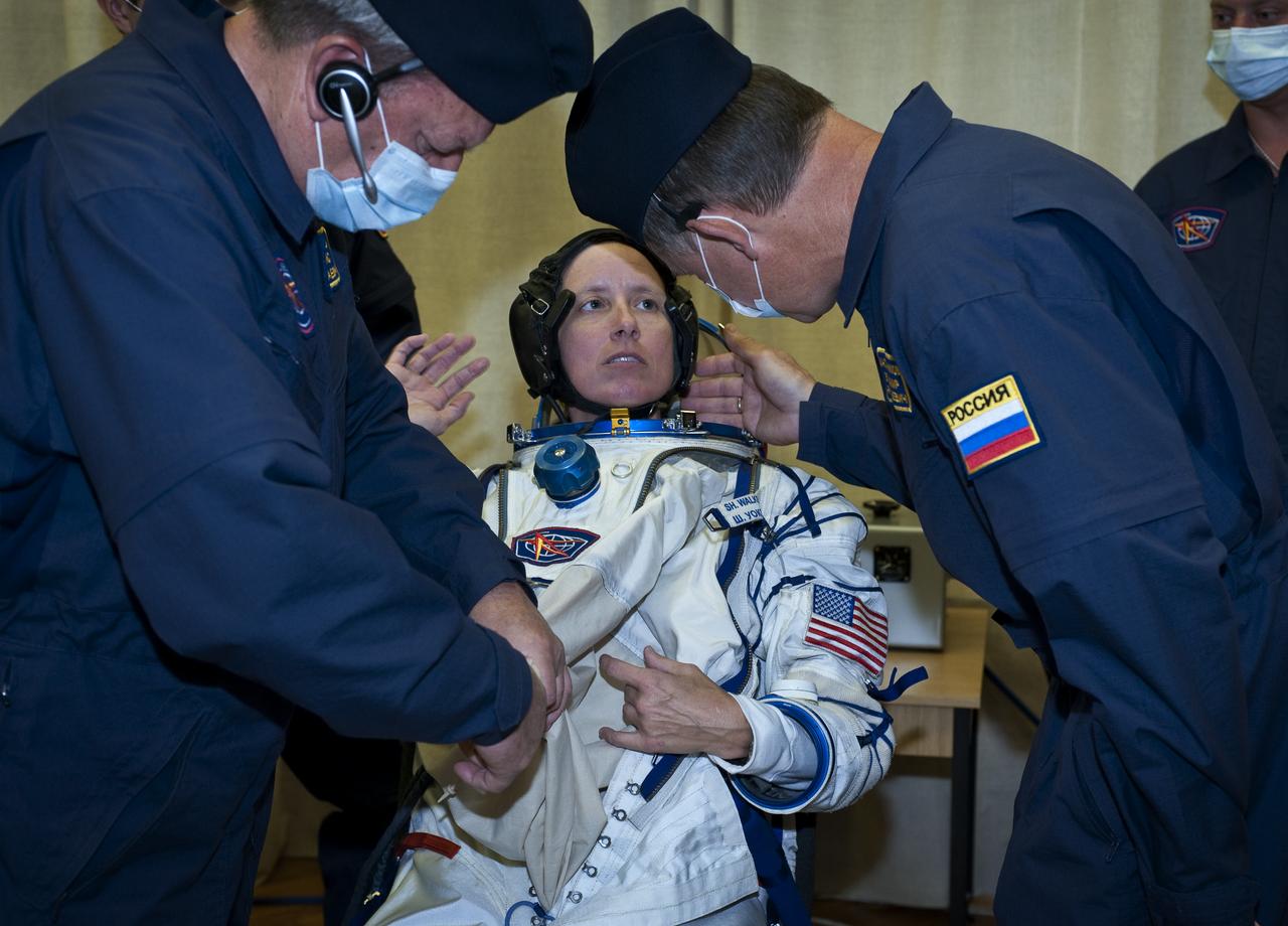 Expedition 24 NASA Flight Engineer Shannon Walker has her Russian Sokol suit prepared for launch by technicians at the Baikonur Cosmodrome in Baikonur, Kazakhstan, Tuesday, June 15, 2010. Walker, Soyuz Commander Fyodor Yurchikhin and Flight Engineer Doug Wheelock launched in their Soyuz TMA-19 rocket from the Baikonur Cosmodrome in Kazakhstan on Wednesday, June 16, 2010. (Photo Credit: NASA/Carla Cioffi)