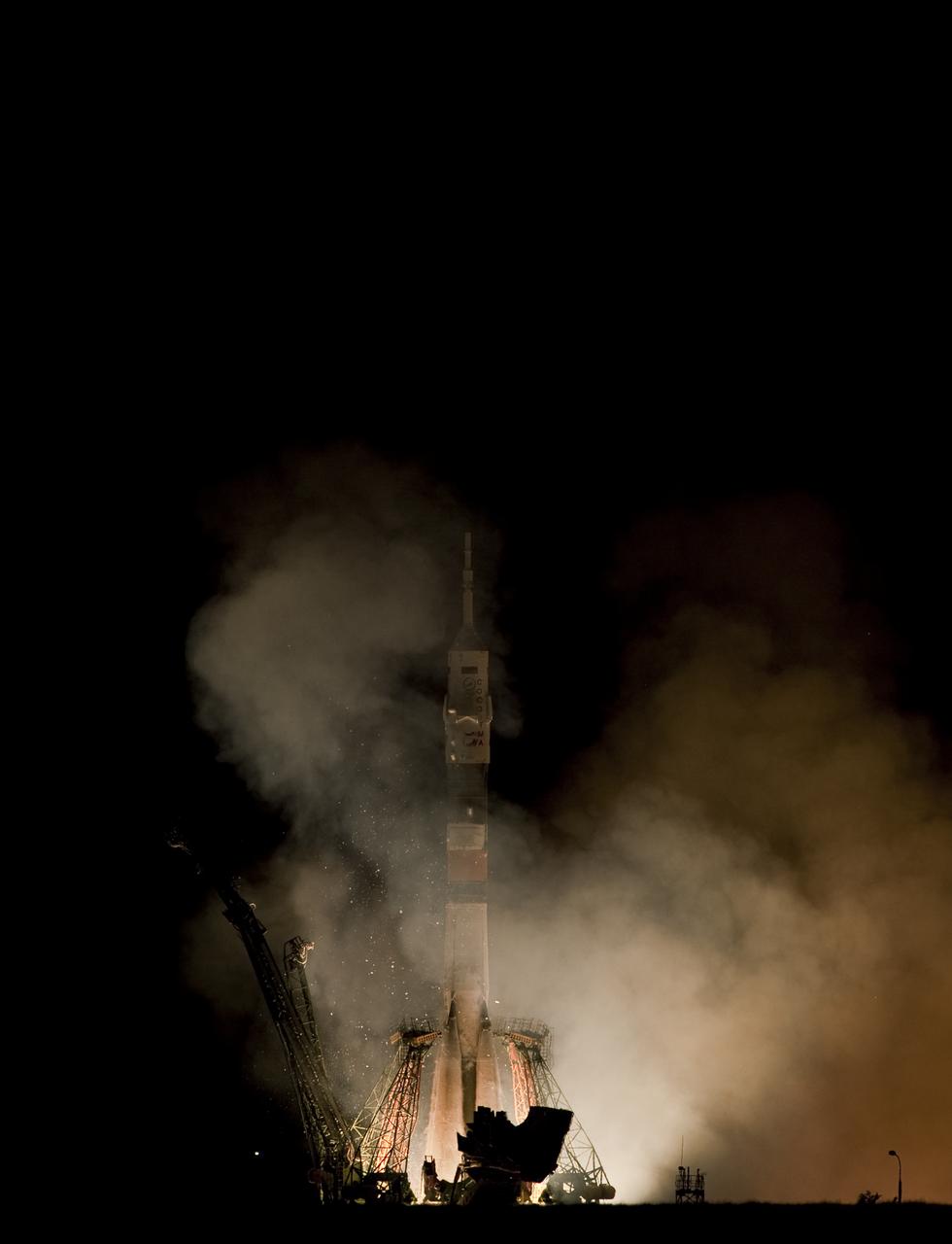 The Soyuz TMA-19 rocket launches from the Baikonur Cosmodrome in Kazakhstan on Wednesday, June 16, 2010 carrying Expedition 24 NASA Flight Engineers Shannon Walker and Douglas Wheelock, and Soyuz Commander Fyodor Yurchikhin of Russia to the International Space Station. Their Soyuz TMA-19 rocket launched at 3:35 a.m Kazakhstan time. (Photo Credit: NASA/Carla Cioffi)