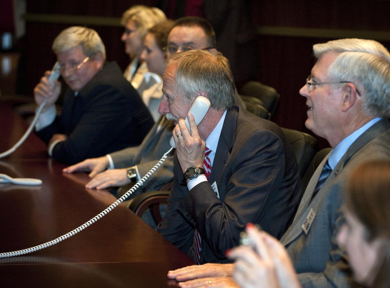 William Gerstenmaier, second from right, NASA Associate Administrator for Space Operations, speaks to the crew of Expedition 24 shortly after their arrival to the International Space Station (ISS) aboard their Soyuz TMA-19 on Friday, June 18, 2010 at Russian Mission Control in Korolev, Russia.  Photo Credit:  (NASA/Carla Cioffi)