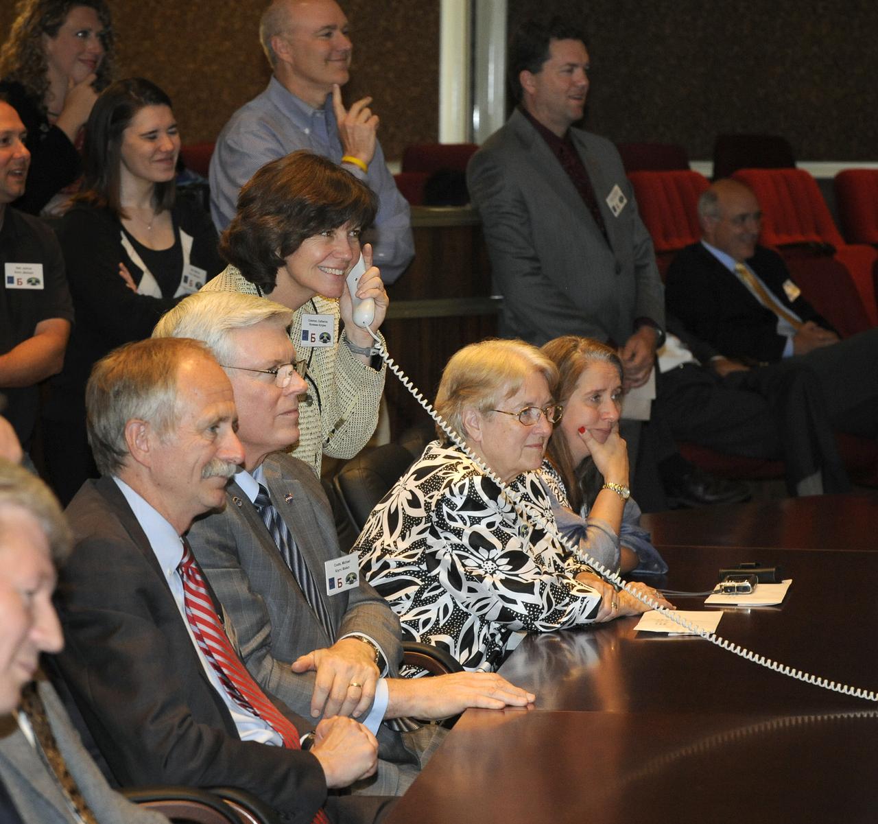 NASA astronaut and Expedition 24 back-up crew member, Cady Coleman, speaks with the crew of Expedition 24 upon their arrival to the International Space Station on Friday, June 18, 2010 at Russian Mission Control Center in Korolev, Russia. Photo Credit: (NASA/Carla Cioffi)