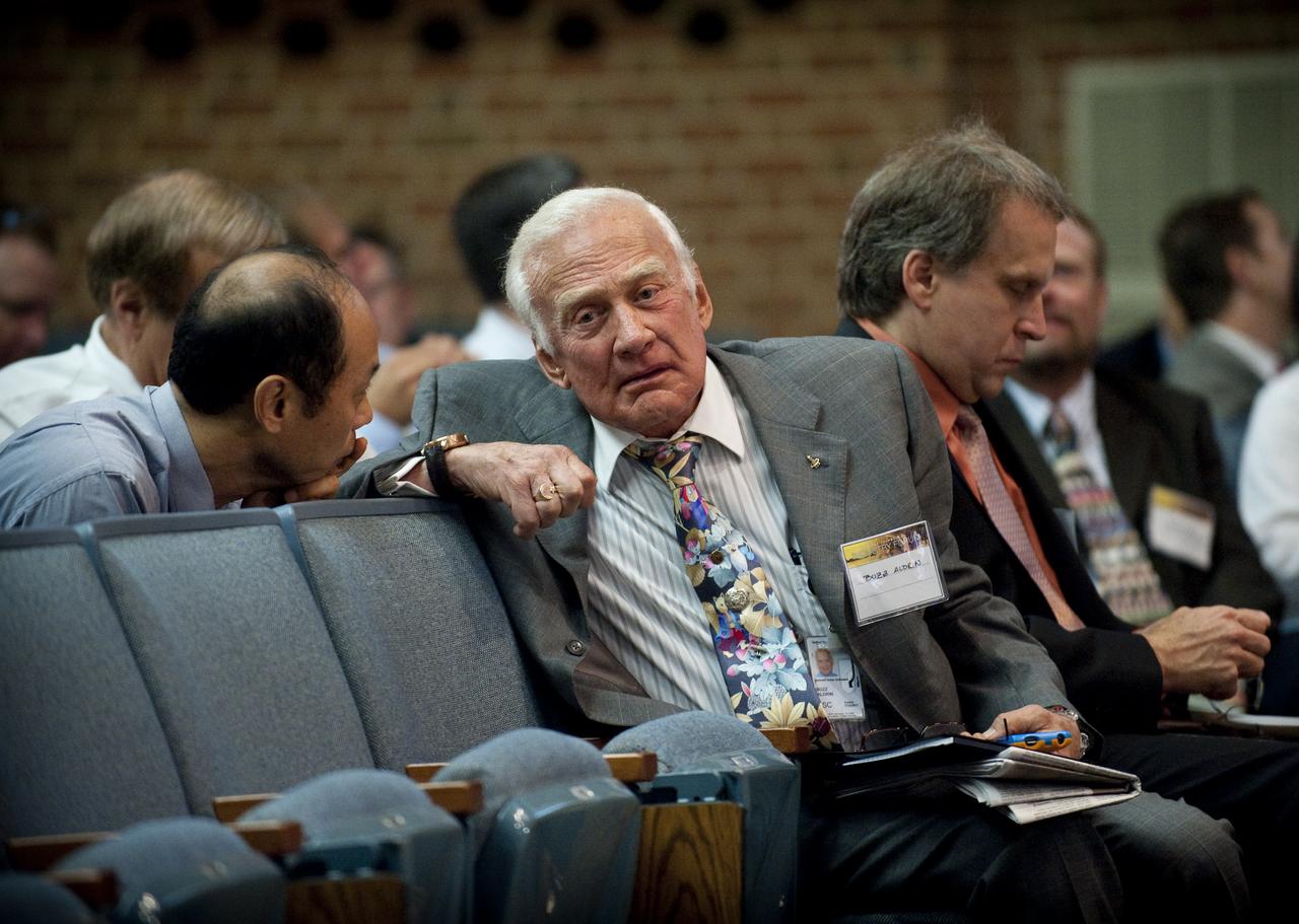 Retired NASA Astronaut and Air Force Col. Buzz Aldrin talks with other attendees of NASA's New Space Technology Industry Forum being held at the University of Maryland in College Park on Tuesday, July 13, 2010.  During the two-day event, speakers are focusing on the president's fiscal year 2011 budget request for NASA's new Space Technology Program. Representatives from industry, academia and the federal government are in attendance to discuss strategy, development and implementation of NASA's proposed new technology-enabled exploration.  Photo Credit: (NASA/Bill Ingalls)