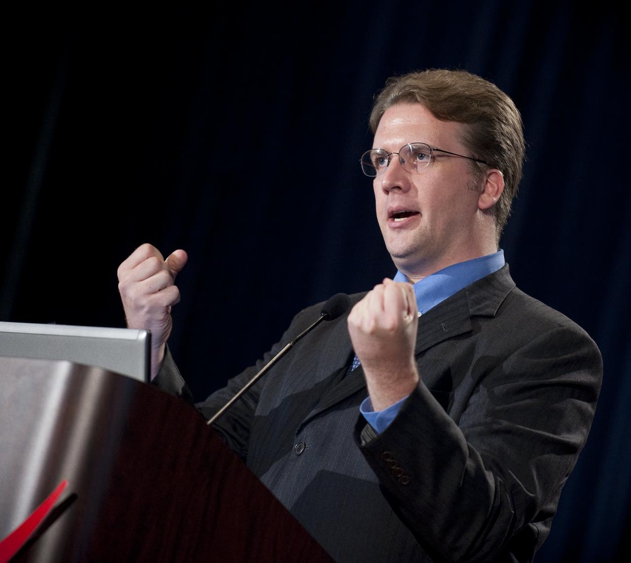 NASA Small Satellite Subsystem Technology and Edison Small Satellite Demonstrations Program Executive Brant Sponberg speaks during the NASA New Space Technology Industry Forum being held at the University of Maryland in College Park on Tuesday, July 13, 2010.  During the two-day event, speakers are focusing on the president's fiscal year 2011 budget request for NASA's new Space Technology Program. Representatives from industry, academia and the federal government are in attendance to discuss strategy, development and implementation of NASA's proposed new technology-enabled exploration.  Photo Credit: (NASA/Bill Ingalls)