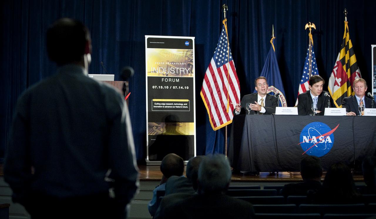 Bobby Braun, third from right, NASA Chief Technologist, answers a question during the NASA New Space Technology Industry Forum being held at the University of Maryland in College Park on Wednesday, July 14, 2010.  During the two-day event, speakers are focusing on the president's fiscal year 2011 budget request for NASA's new Space Technology Program. Representatives from industry, academia and the federal government are in attendance to discuss strategy, development and implementation of NASA's proposed new technology-enabled exploration.  Photo Credit: (NASA/Carla Cioffi)
