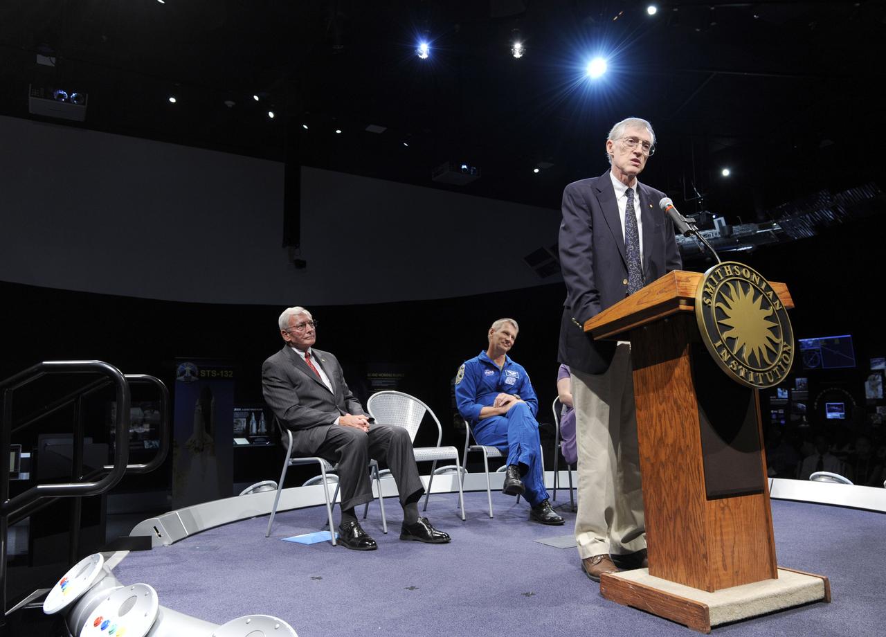 NASA Astrophycist Dr. John Mather, at podium, speaks Tuesday, July 27, 2010, at the Smithsonian National Air and Space Museum in Washington as museum director Gen. John R. "Jack" Dailey, U.S. Marine Corps ret. and STS-132 astronaut Piers Sellers look on. Sellers returned a replica of the Nobel Prize that is in the museum's collection and was flown aboard STS-132 Atlantis. The prize was won by Mather and University of California, Berkeley researcher George Smoot in 2006 for their work using the Cosmic Background Explorer Satellite to understand the big-bang theory of the universe.Photo Credit: (NASA/Paul E. Alers)
