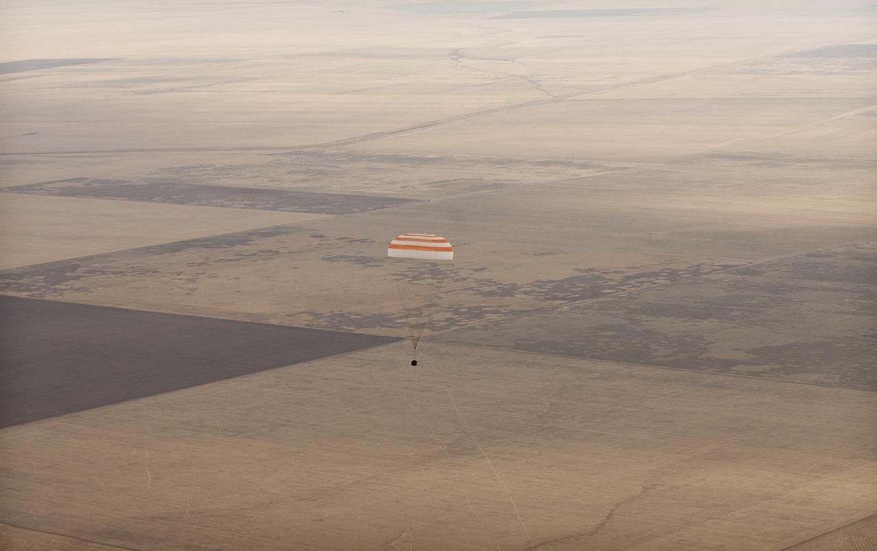 The Soyuz TMA-18 spacecraft is seen as it lands with Expedition 24 Commander Alexander Skvortsov and Flight Engineers Tracy Caldwell Dyson and Mikhail Kornienko near the town of Arkalyk, Kazakhstan on Saturday, Sept. 25, 2010. Russian Cosmonauts Skvortsov and Kornienko and NASA Astronaut Caldwell Dyson, are returning from six months onboard the International Space Station where they served as members of the Expedition 23 and 24 crews. Photo Credit: (NASA/Bill Ingalls)