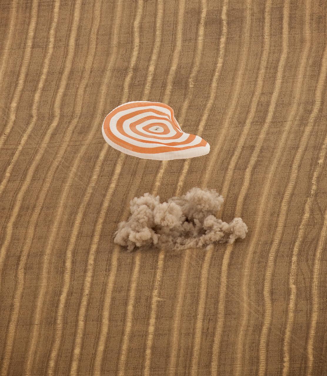The Soyuz TMA-18 spacecraft is seen as it lands with Expedition 24 Commander Alexander Skvortsov and Flight Engineers Tracy Caldwell Dyson and Mikhail Kornienko near the town of Arkalyk, Kazakhstan on Saturday, Sept. 25, 2010. Russian Cosmonauts Skvortsov and Kornienko and NASA Astronaut Caldwell Dyson, are returning from six months onboard the International Space Station where they served as members of the Expedition 23 and 24 crews. Photo Credit: (NASA/Bill Ingalls)