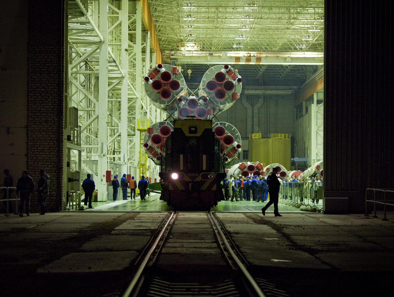 The Soyuz TMA-01M spacecraft is rolled out by train to the launch pad at the Baikonur Cosmodrome, Kazakhstan, Tuesday, Oct. 5, 2010.  The TMA-01M is a new modified Soyuz vehicle that features upgraded avionics and a digital cockpit display.  The crew of Expedition 25 Soyuz Commander Alexander Kaleri, NASA Flight Engineer Scott Kelly and Russian Flight Engineer Oleg Skripochka is scheduled for Friday, Oct. 8, 2010 at 5:10 a.m. Kazakhstan time.  Photo Credit (NASA/Carla Cioffi)