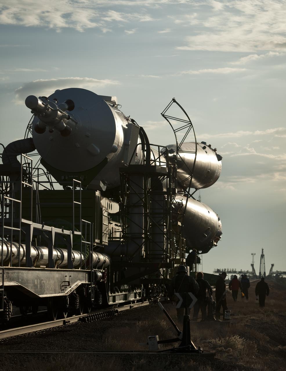 The Soyuz TMA-01M spacecraft is rolled out by train to the launch pad at the Baikonur Cosmodrome, Kazakhstan, Tuesday, Oct. 5, 2010.  The TMA-01M is a new modified Soyuz vehicle that features upgraded avionics and a digital cockpit display.  The crew of Expedition 25 Soyuz Commander Alexander Kaleri, NASA Flight Engineer Scott Kelly and Russian Flight Engineer Oleg Skripochka is scheduled for Friday, Oct. 8, 2010 at 5:10 a.m. Kazakhstan time.  Photo Credit (NASA/Carla Cioffi)
