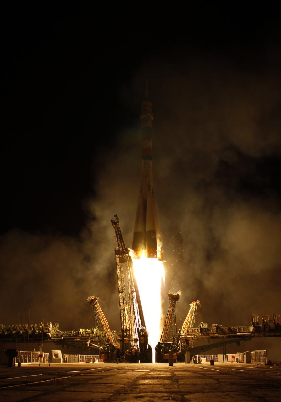 The Soyuz TMA-01M rocket launches from the Baikonur Cosmodrome in Kazakhstan on Friday, October 8, 2010 carrying Expedition 25 Soyuz Commander Alexander Kaleri of Russia, NASA Flight Engineer Scott J. Kelly and Russian Flight Engineer Oleg Skripochka to the International Space Station. Their Soyuz TMA-01M rocket launched at 5:10 a.m Kazakhstan time.  (Photo Credit: NASA/Carla Cioffi)