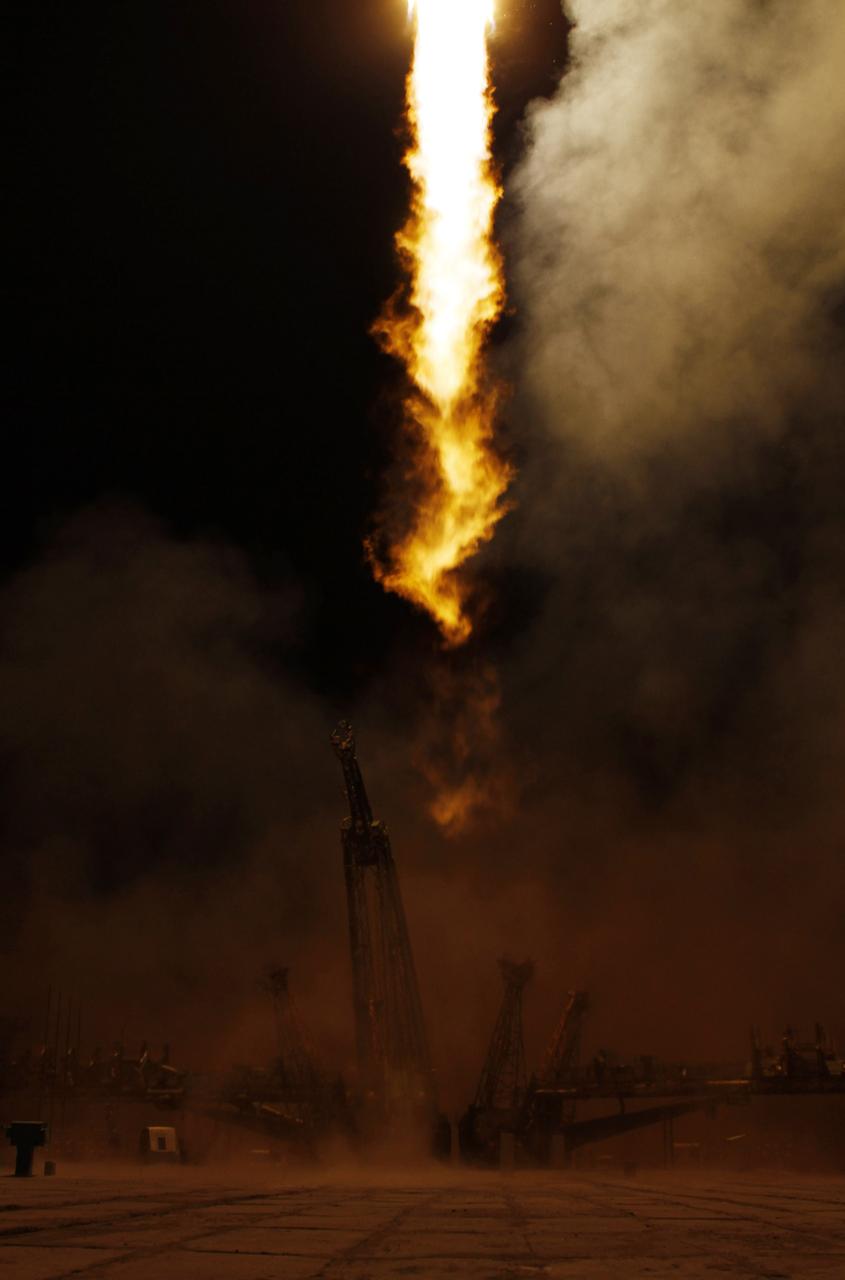 The Soyuz TMA-01M rocket launches from the Baikonur Cosmodrome in Kazakhstan on Friday, October 8, 2010 carrying Expedition 25 Soyuz Commander Alexander Kaleri of Russia, NASA Flight Engineer Scott J. Kelly and Russian Flight Engineer Oleg Skripochka to the International Space Station. Their Soyuz TMA-01M rocket launched at 5:10 a.m Kazakhstan time.  (Photo Credit: NASA/Carla Cioffi)