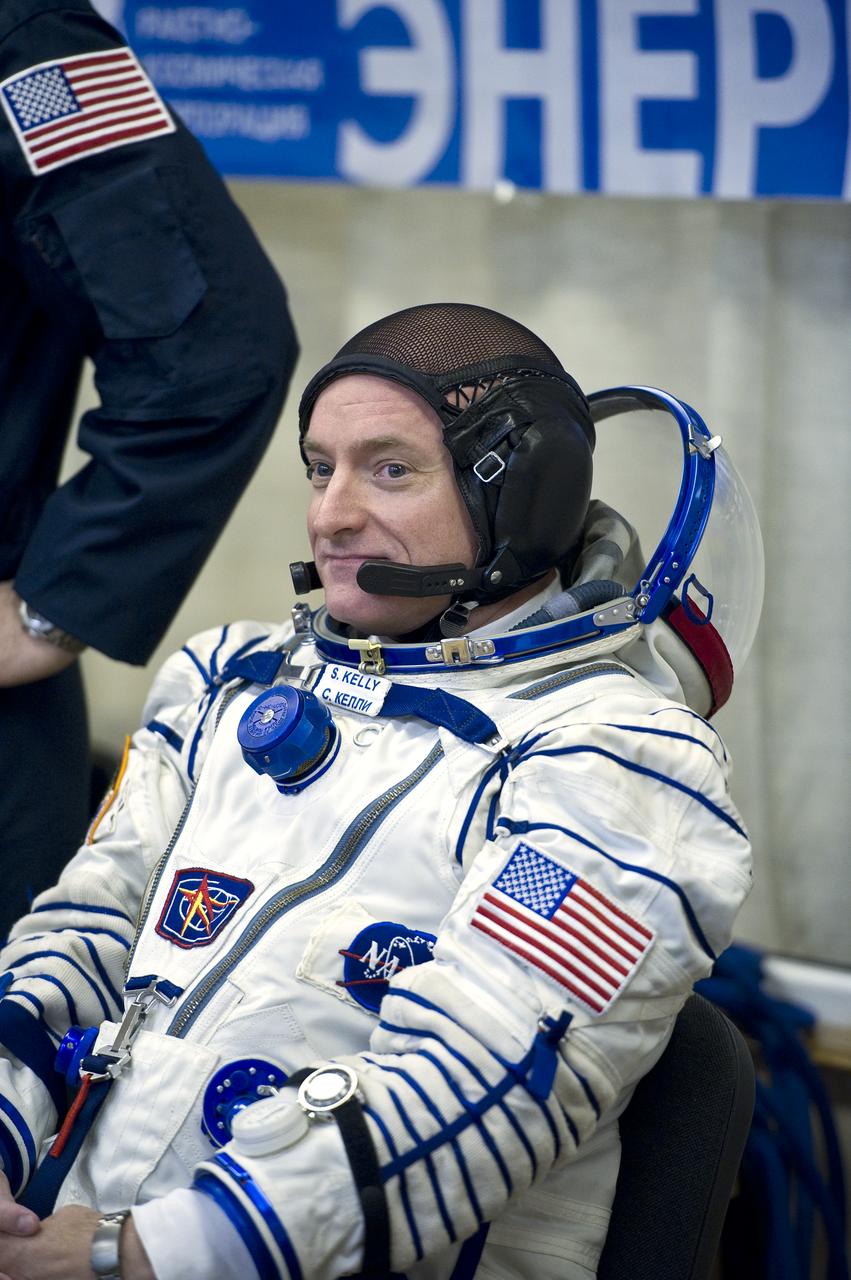 Expedition 25 Flight Engineer Scott Kelly awaits to have his Russian Sokol Suit pressure checked at the Baikonur Cosmodrome in Kazakhstan on Friday, Oct. 8, 2010. (Photo Credit: NASA/Carla Cioffi)