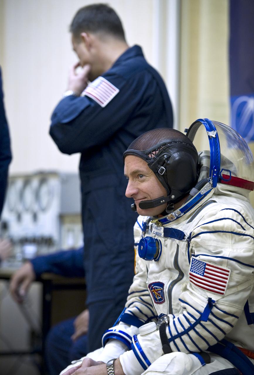 Expedition 25 NASA Flight Engineer Scott Kelly awaits to have his Russian Sokol Suit pressure checked at the Baikonur Cosmodrome in Kazakhstan on Friday, Oct. 8, 2010. (Photo Credit: NASA/Carla Cioffi)