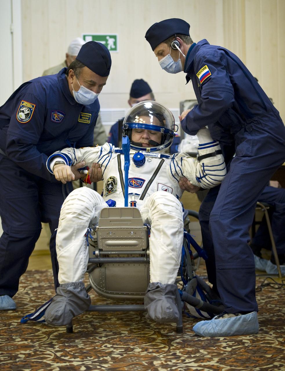 Expedition 25 Flight Engineer Oleg Skripochka has his Russian Sokol Suit pressure checked at the Baikonur Cosmodrome in Kazakhstan on Friday, Oct. 8, 2010. (Photo Credit: NASA/Carla Cioffi)