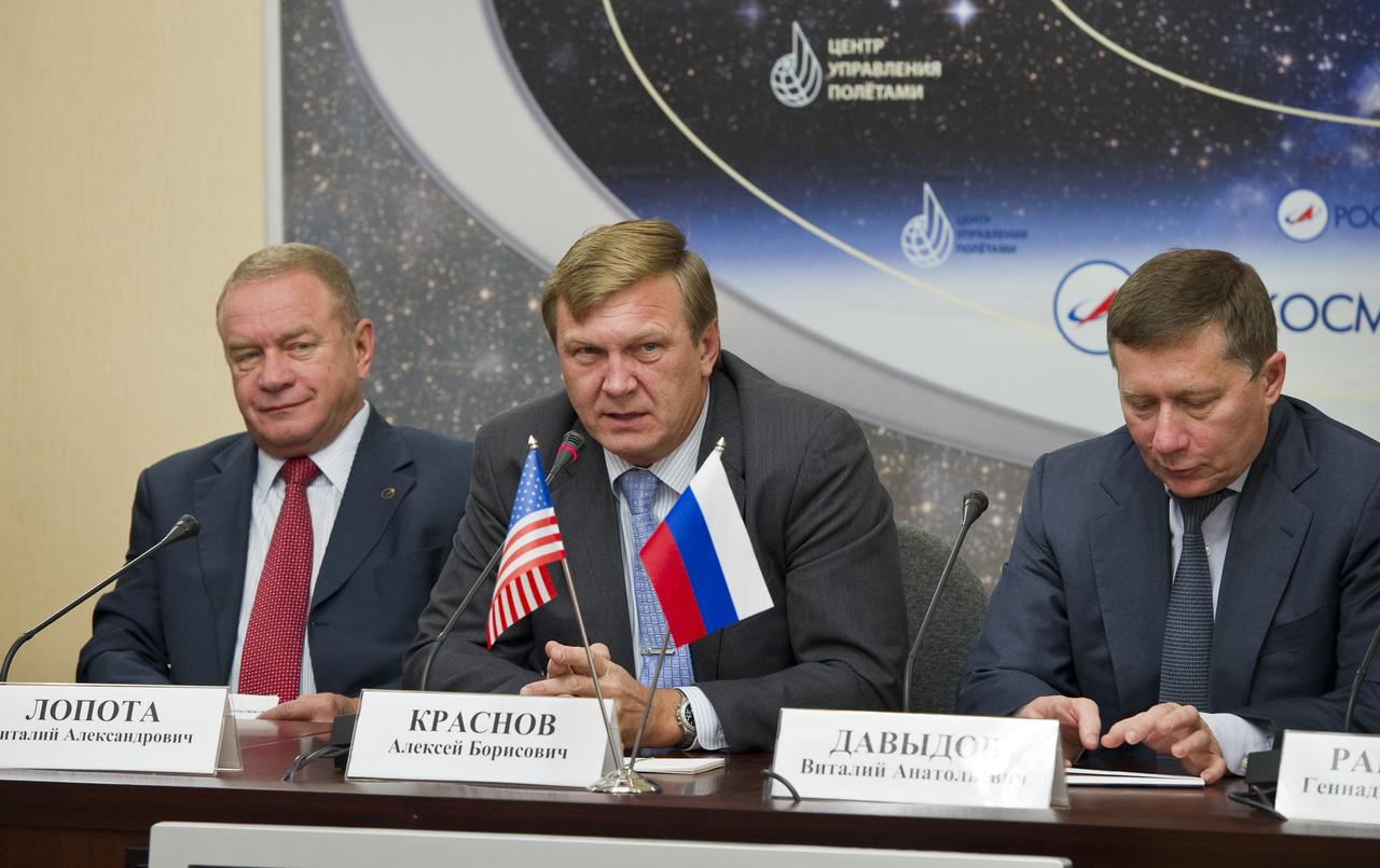Alexei Krasnov, center, Director of Manned Space Programs Department, Roscosmos, answers a reporter’s question during a Soyuz post-docking press conference at the Russian Mission Control Center in Korolev, Russia on Sunday, Oct. 10, 2010.  Photo Credit: (NASA/Carla Cioffi)