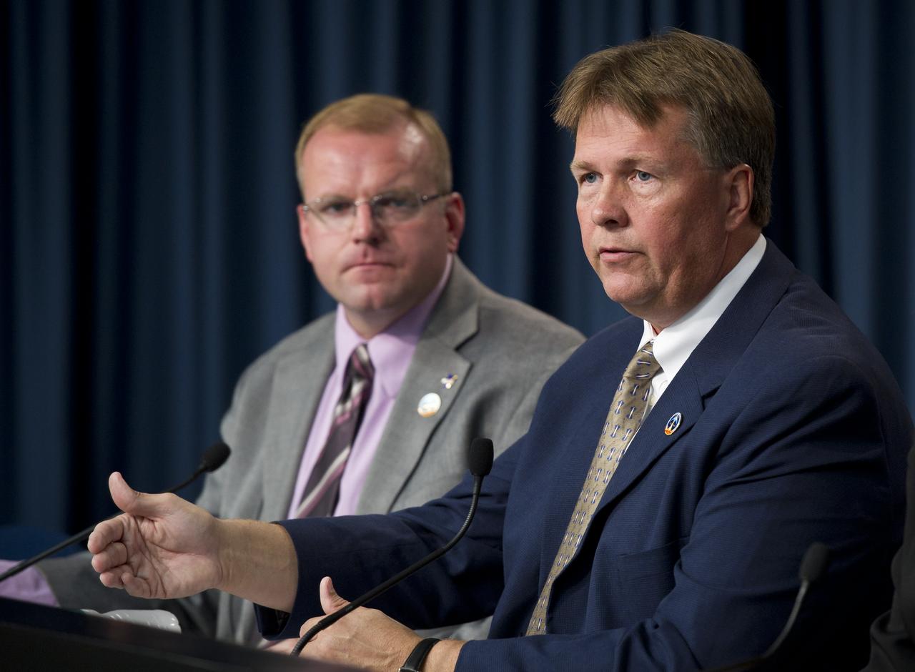 NASA Spokesperson Allard Beutel, left, and NASA Test Director Jeff Spaulding, participate in the space shuttle Discovery launch status briefing on Friday, Oct. 29, 2010 at the NASA Kennedy Space Center in Cape Canaveral, Fla.  Discovery and it's STS-133 mission crew of six are currently targeted to launch at 4:17p.m. EDT on Tuesday, Nov. 2, 2010.  Photo Credit: (NASA/Bill Ingalls)