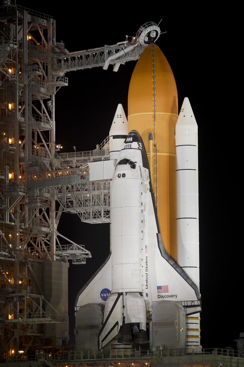 The space shuttle Discovery is seen on launch Pad 39a after the Rotating Service Structure (RSS) is rolled back on Wednesday, Nov. 3, 2010 at the NASA Kennedy Space Center in Cape Canaveral, Fla.  During space shuttle Discovery's final spaceflight, the STS-133 crew members will take important spare parts to the International Space Station along with the Express Logistics Carrier-4. Photo Credit: (NASA/Bill Ingalls)
