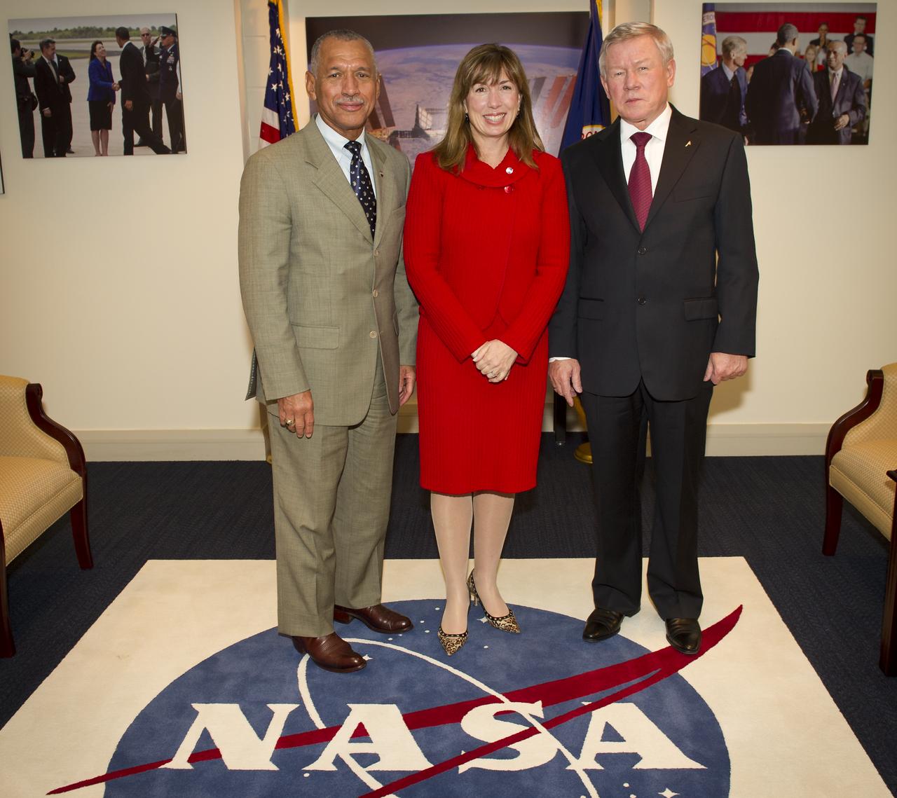 NASA Administrator Charles Bolden, left, and NASA Deputy Administrator Lori Garver, welcome Head of the Russian Federal Space Agency Anatoly Perminov, right, for the third Space Cooperation Working Group meeting of the U.S. – Russia Bilateral Presidential Commission on Thursday, Nov. 18, 2010 in Washington.  Photo Credit: (NASA/Bill Ingalls)