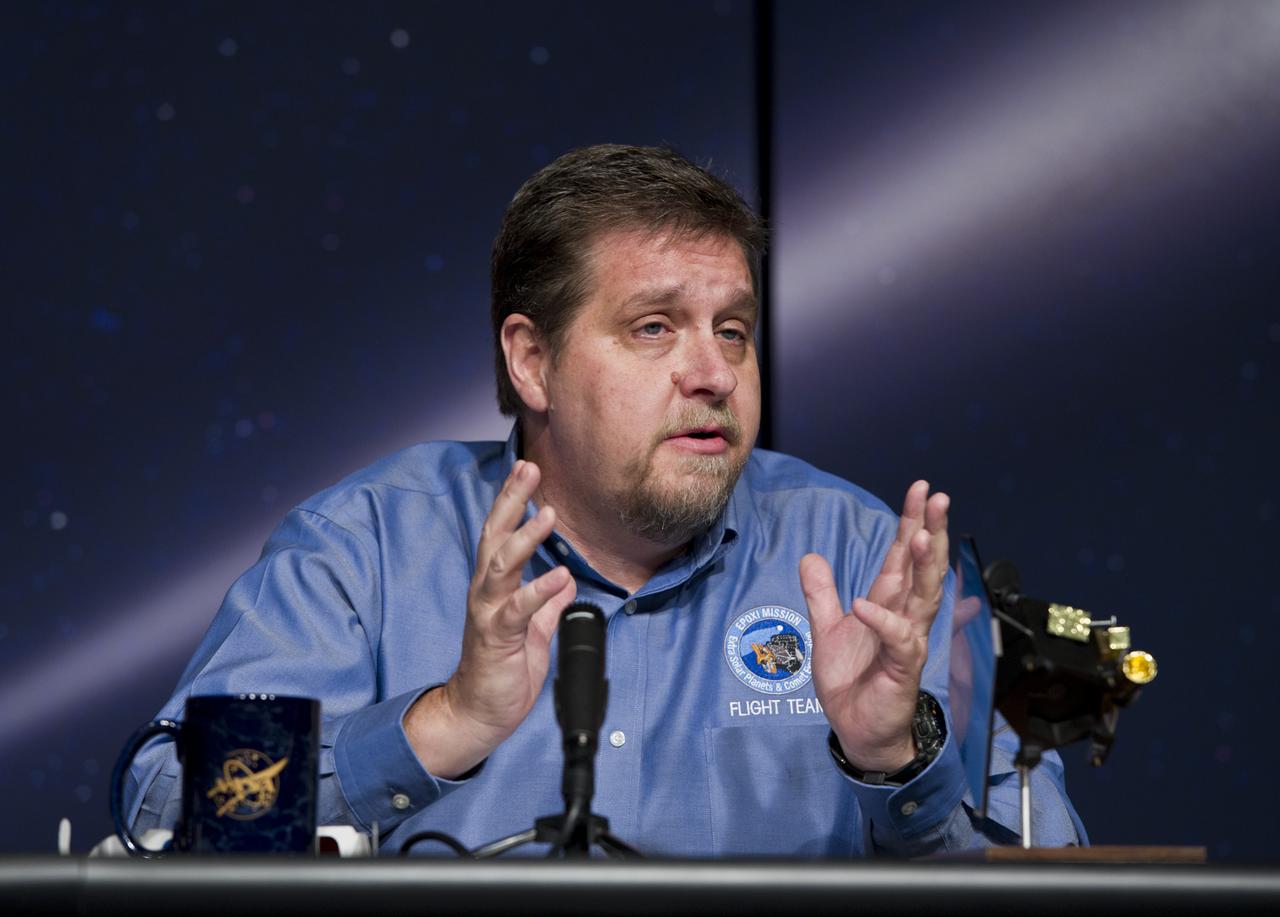 Tim Larson, EPOXI Project Manager from the Jet Propulsion Laboratory in Pasadena, Calif., speaks during a press conference, Thursday, Nov. 18, 2010, at NASA Headquarters in Washington. The press conference was held to discuss the Nov. 4 successful flyby of Comet Hartley 2 by NASA's EPOXI Mission Spacecraft. Images from the flyby provided scientists the most extensive observations of a comet in history. Photo Credit: (NASA/Paul E. Alers)
