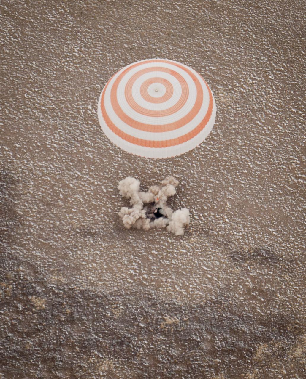 The Soyuz TMA-19 spacecraft with Expedition 25 Commander Doug Wheelock and Flight Engineers Shannon Walker and Fyodor Yurchikhin touches down near the town of Arkalyk, Kazakhstan on Friday, Nov. 26, 2010. Russian Cosmonaut Yurchikhin and NASA Astronauts Wheelock and Walker, are returning from nearly six months onboard the International Space Station where they served as members of the Expedition 24 and 25 crews. Photo Credit: (NASA/Bill Ingalls)